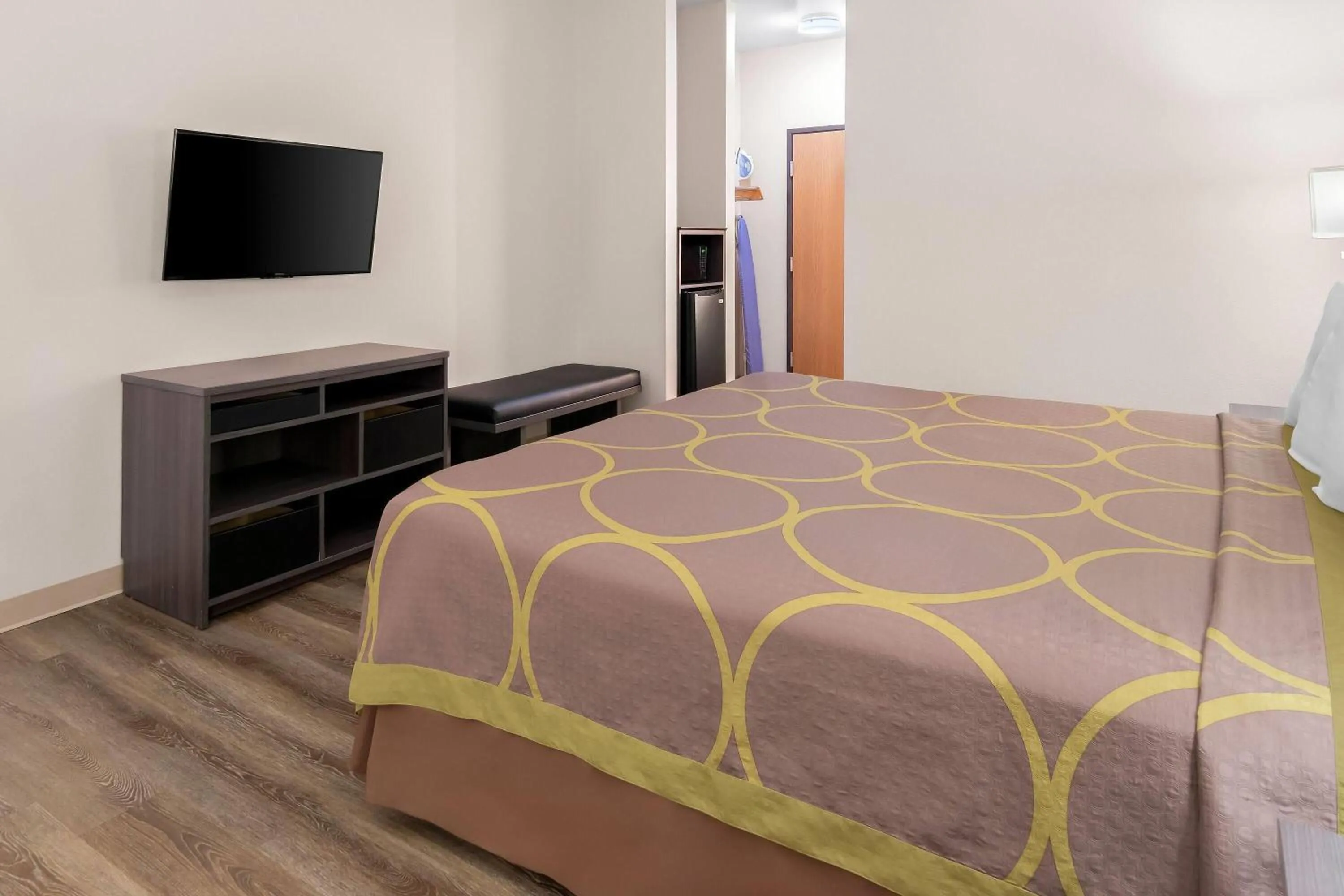 Bed in Super 8 by Wyndham Fort Worth Stockyards