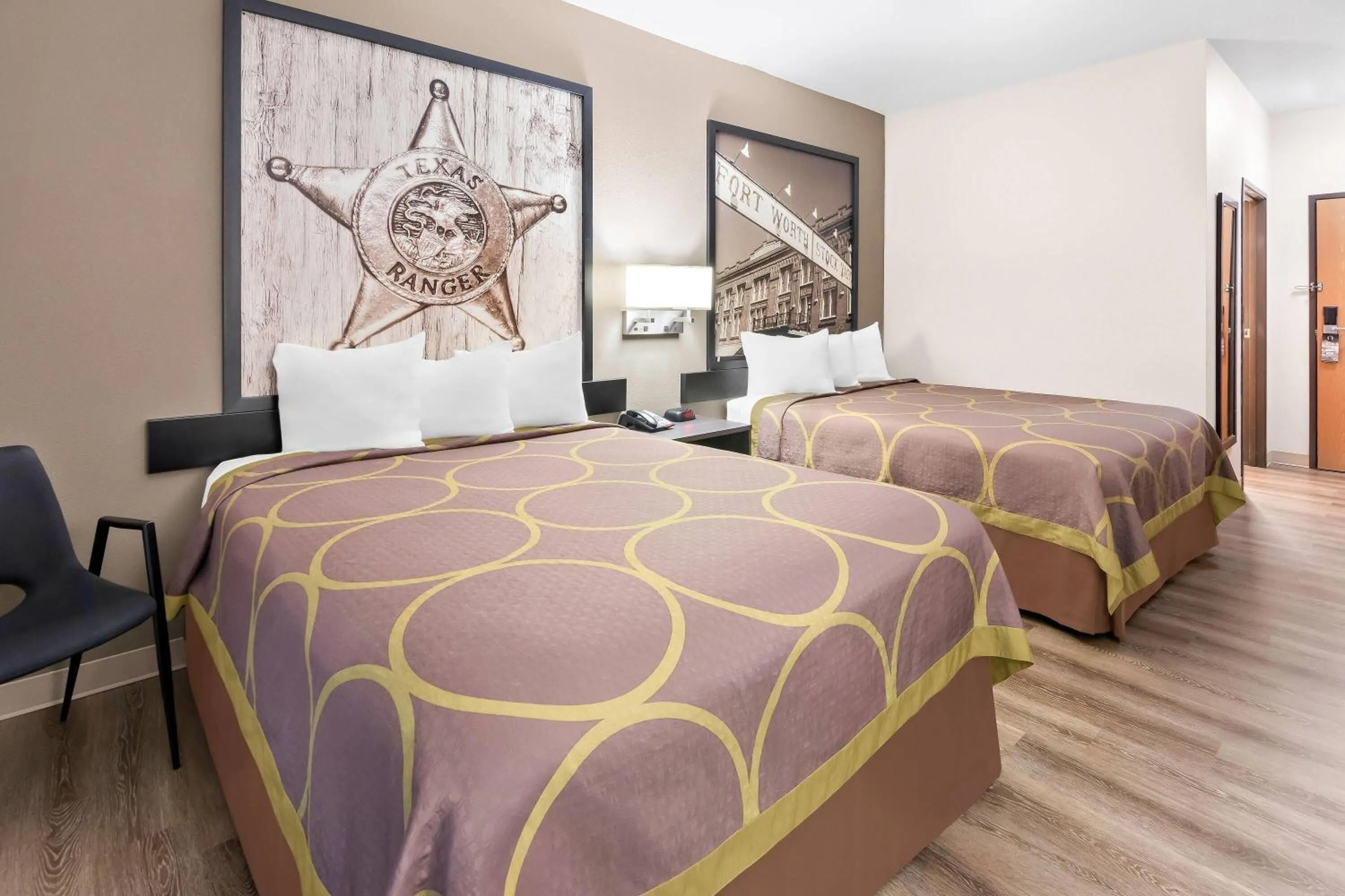 Bed in Super 8 by Wyndham Fort Worth Stockyards