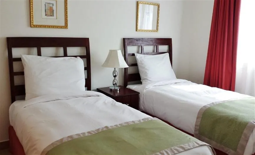 Bed in Seashell Julai'a Hotel & Resort Family resort