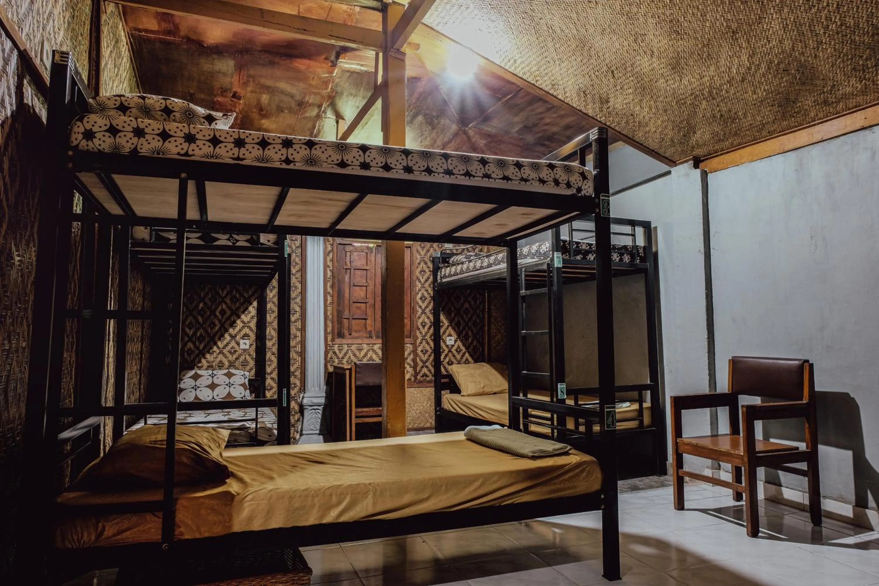 Bed in BILIK BAMBOO HOMESTAY