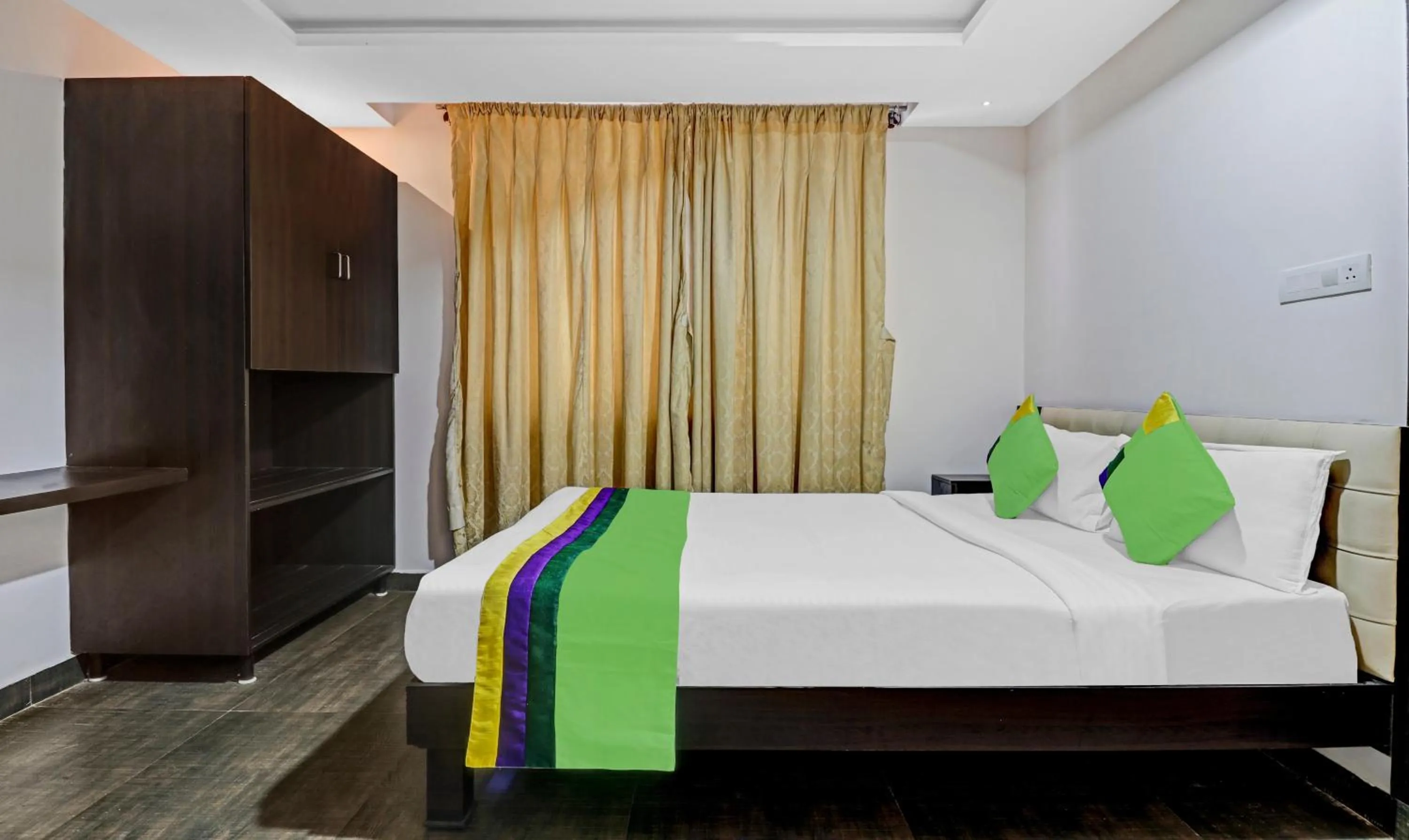 Bed in Treebo JJ Residency