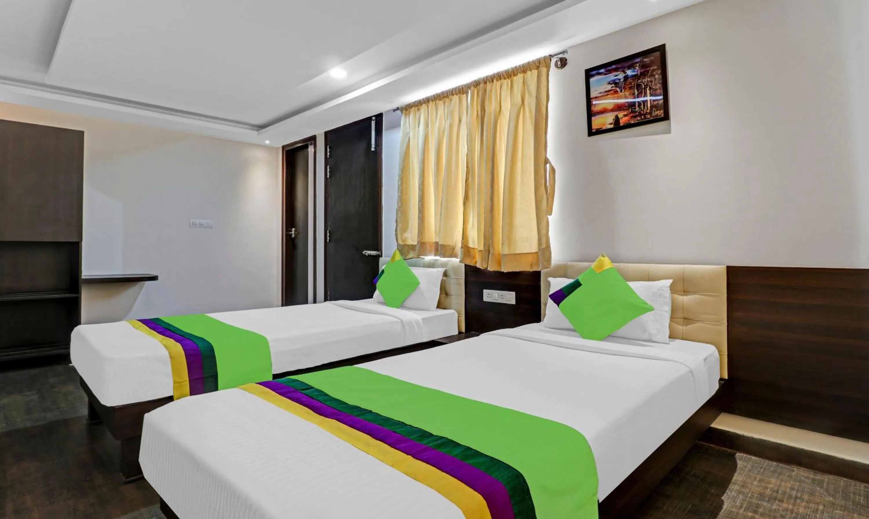 Bed in Treebo JJ Residency