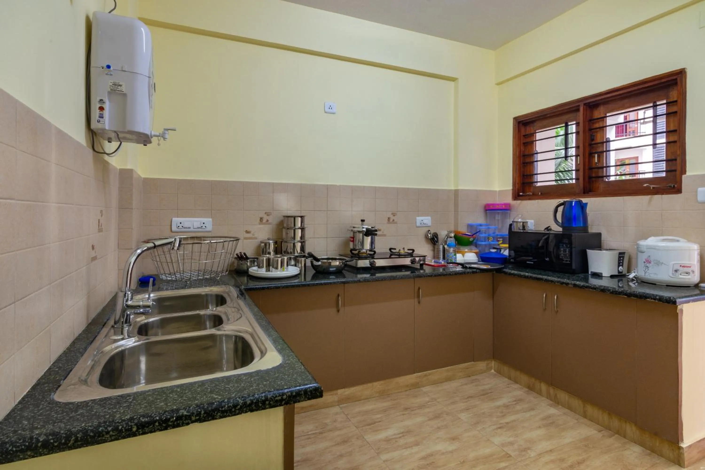 Kitchen or kitchenette in Guesture Serviced Residences, Alta Vista