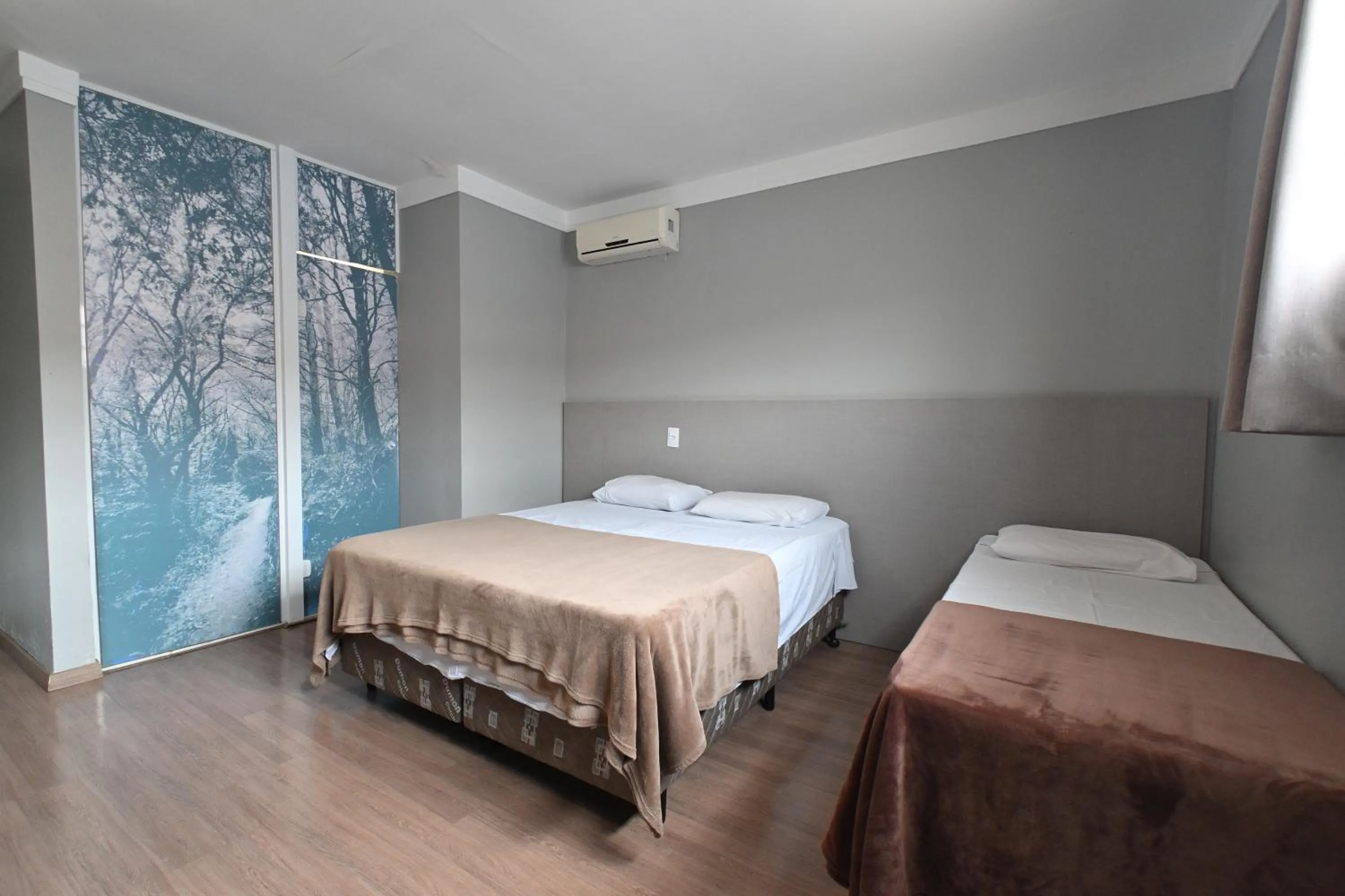 Bed in Hotel PrimeInn