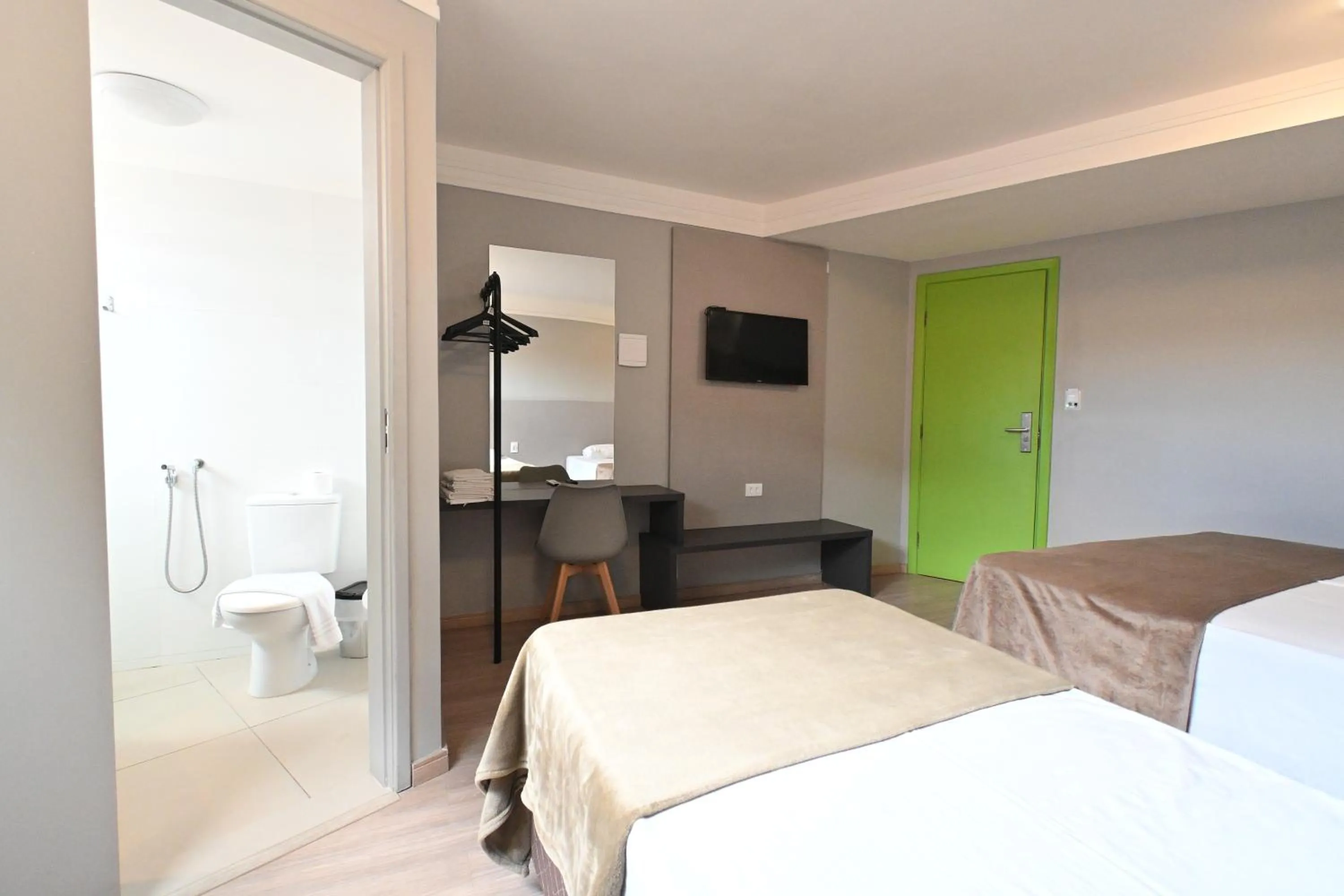 Toilet, Bed in Hotel PrimeInn