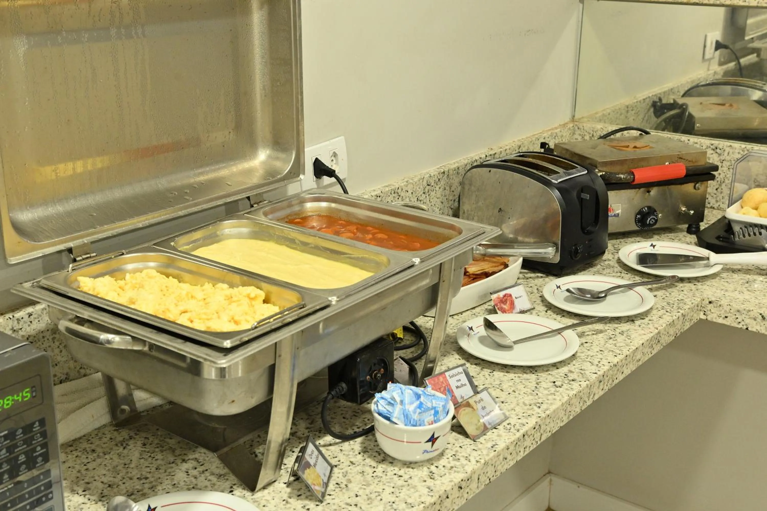 Kitchen or kitchenette in Hotel PrimeInn