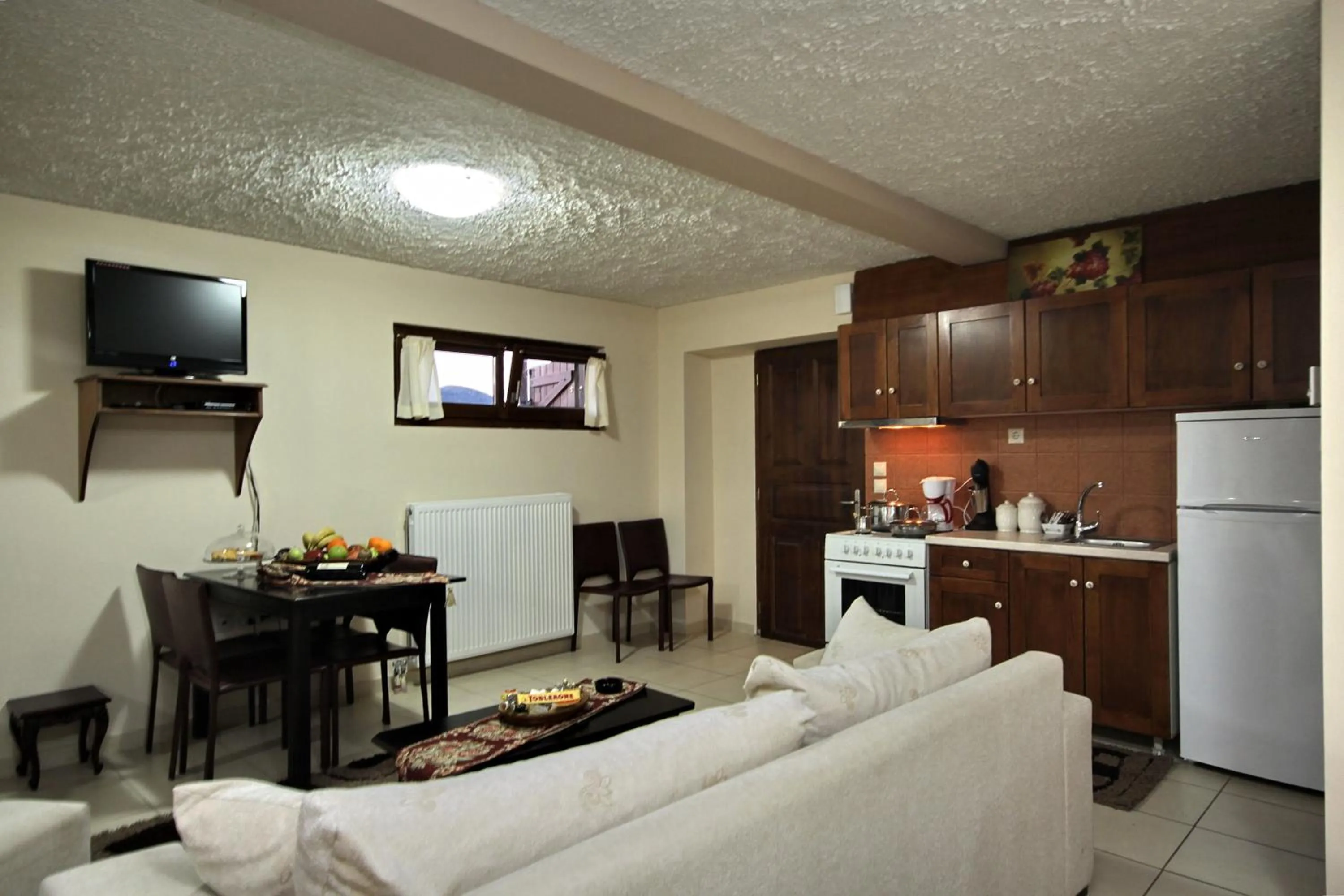 Living room in Menalia Villas & Suites ΚΤΗΜΑ ΚΟΥΜΠΟΥΡΗ