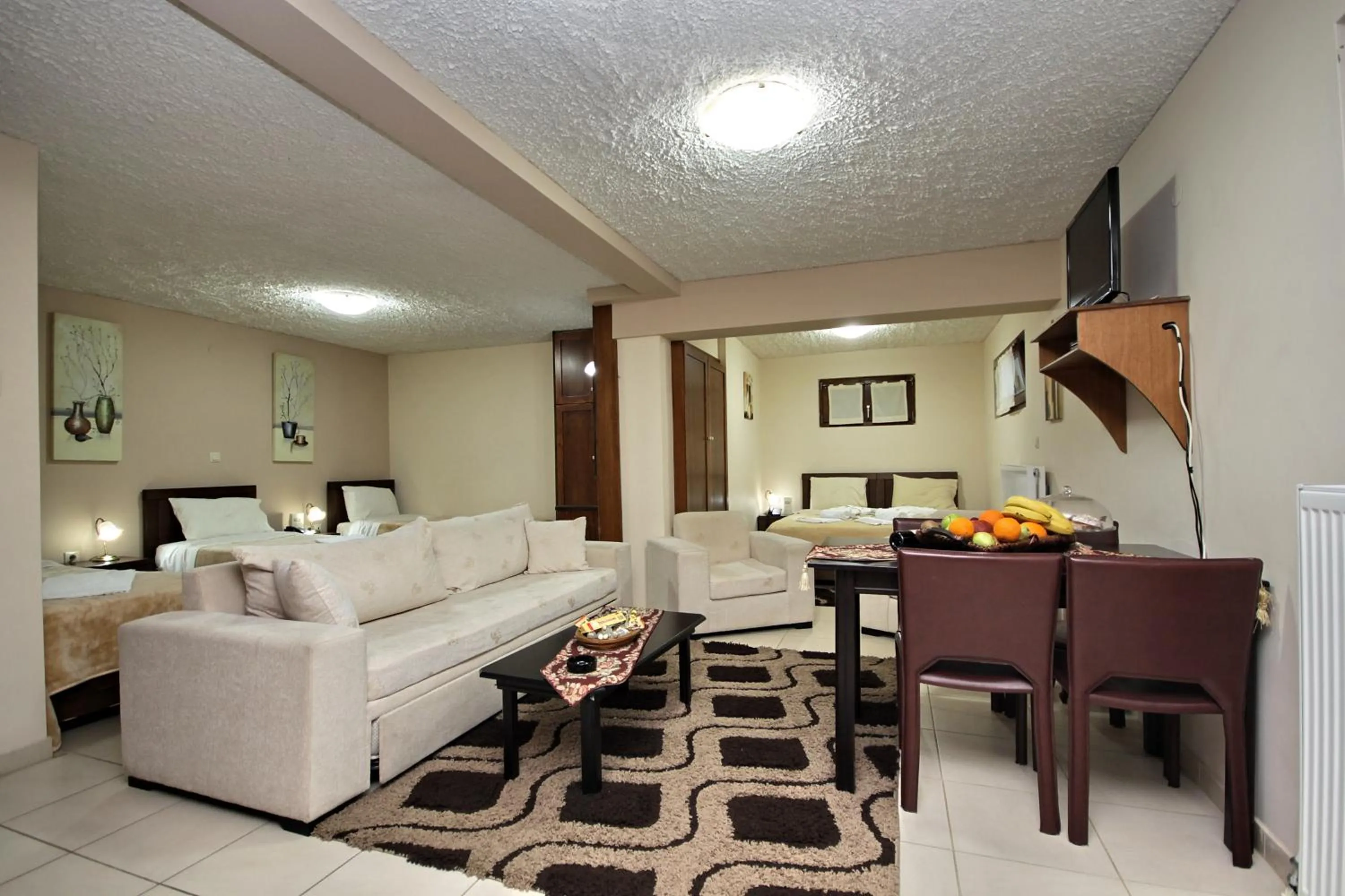 Living room in Menalia Villas & Suites ΚΤΗΜΑ ΚΟΥΜΠΟΥΡΗ