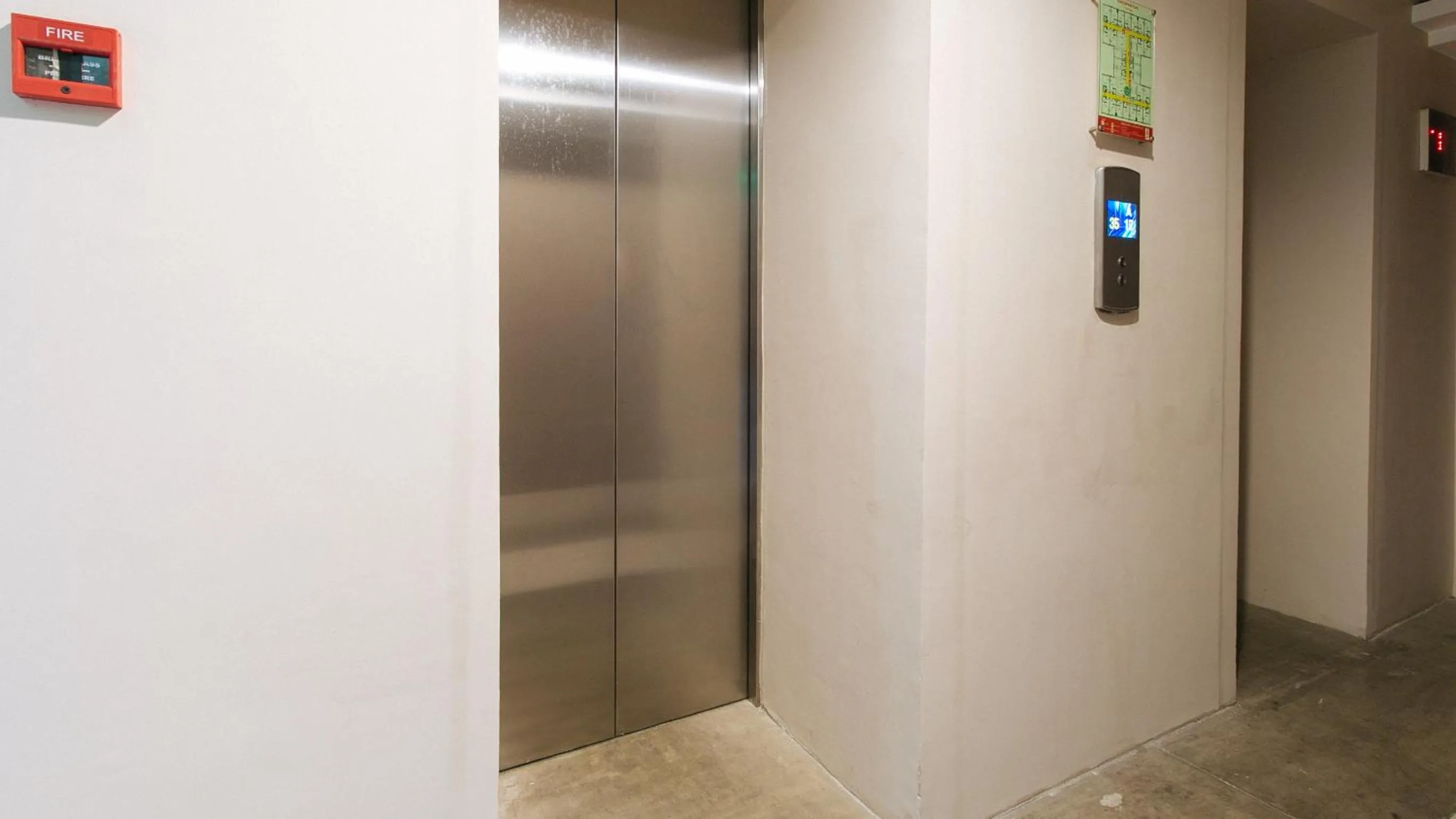elevator in Eimy's Place at Urban Deca Mandaluyong by RedDoorz