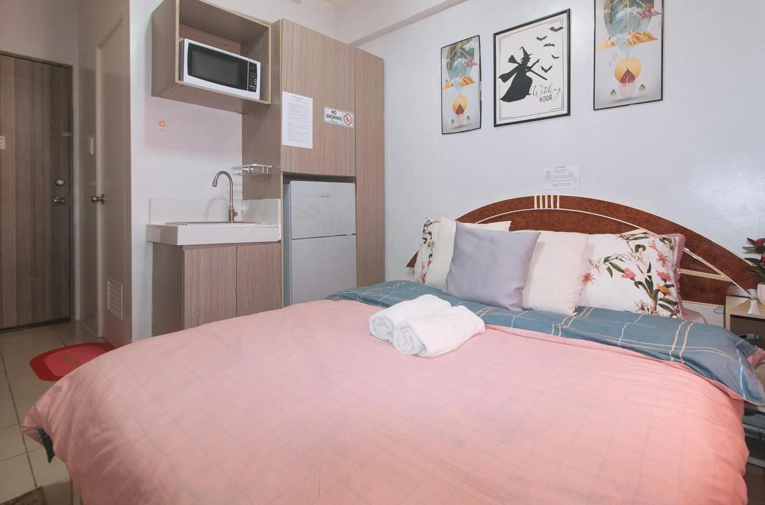 Bed in Eimy's Place at Urban Deca Mandaluyong by RedDoorz