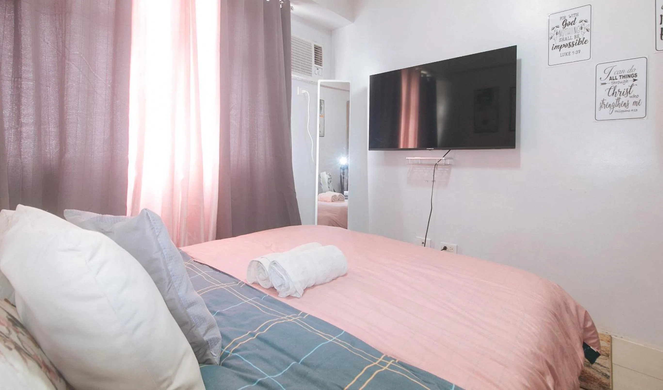 Bed in Eimy's Place at Urban Deca Mandaluyong by RedDoorz