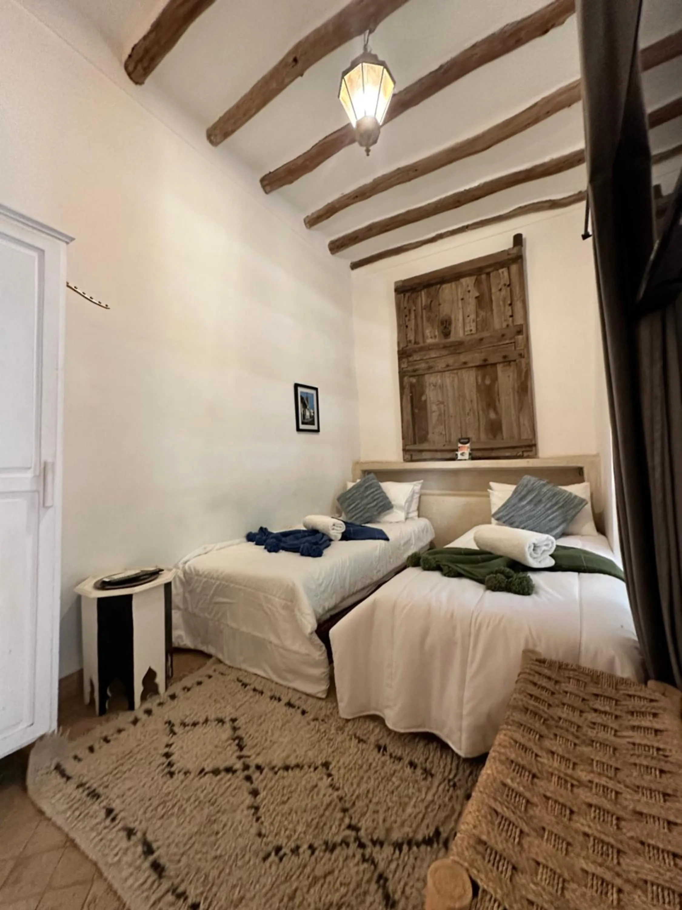 Bed in Riad 103 Medina Pool and Hammam