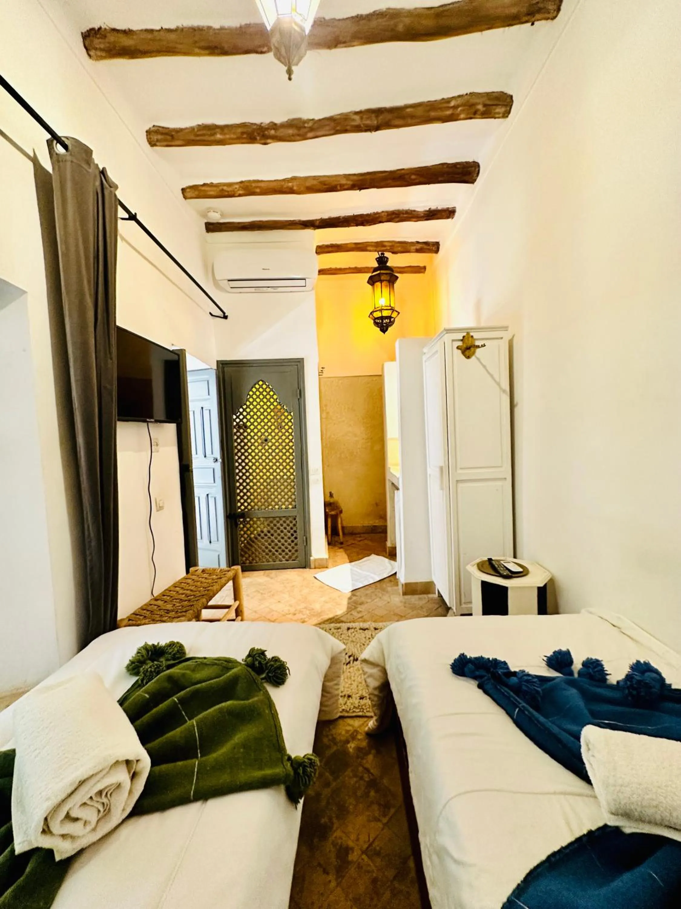 Bed in Riad 103 Medina Pool and Hammam