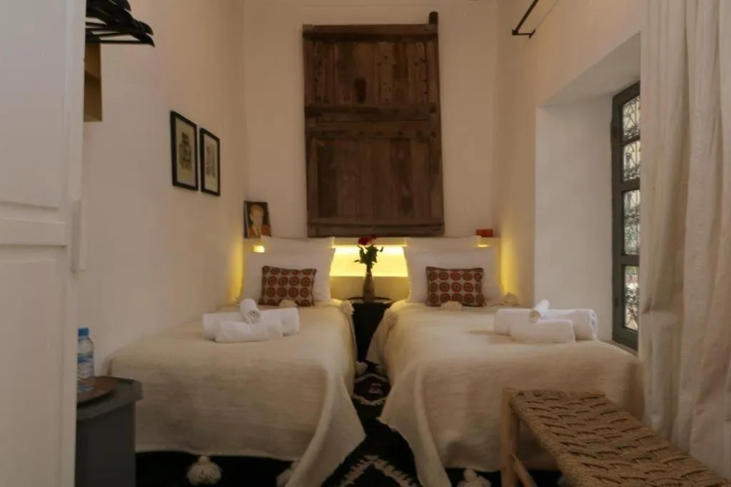 Bed in Riad 103 Medina Pool and Hammam