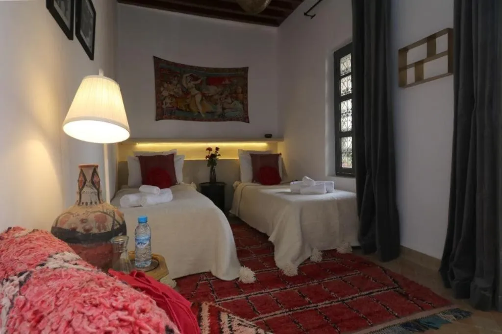 Bed in Riad 103 Medina Pool and Hammam