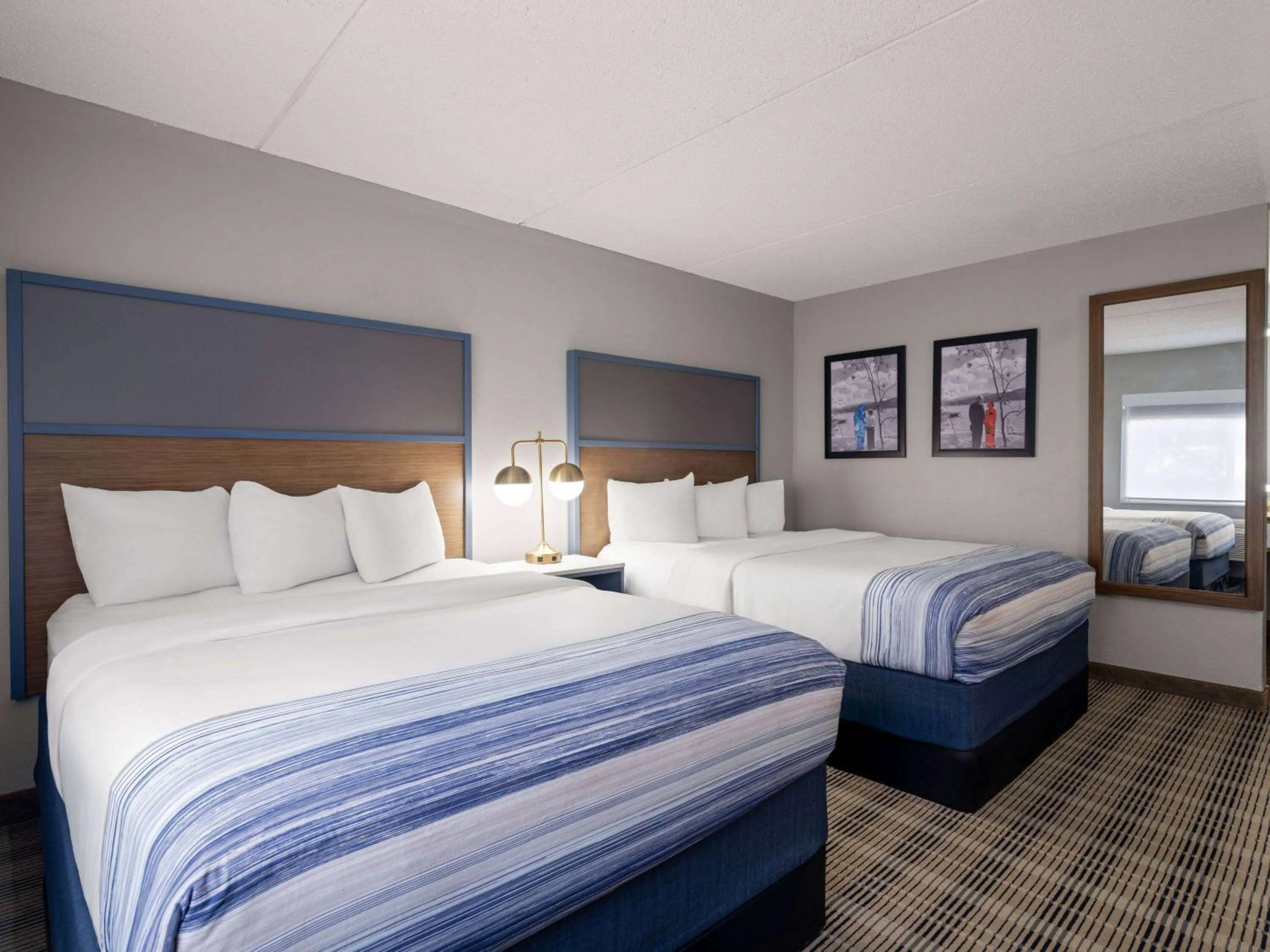 Photo of the whole room, Bed in AmericInn by Wyndham Shakopee Near Canterbury Park