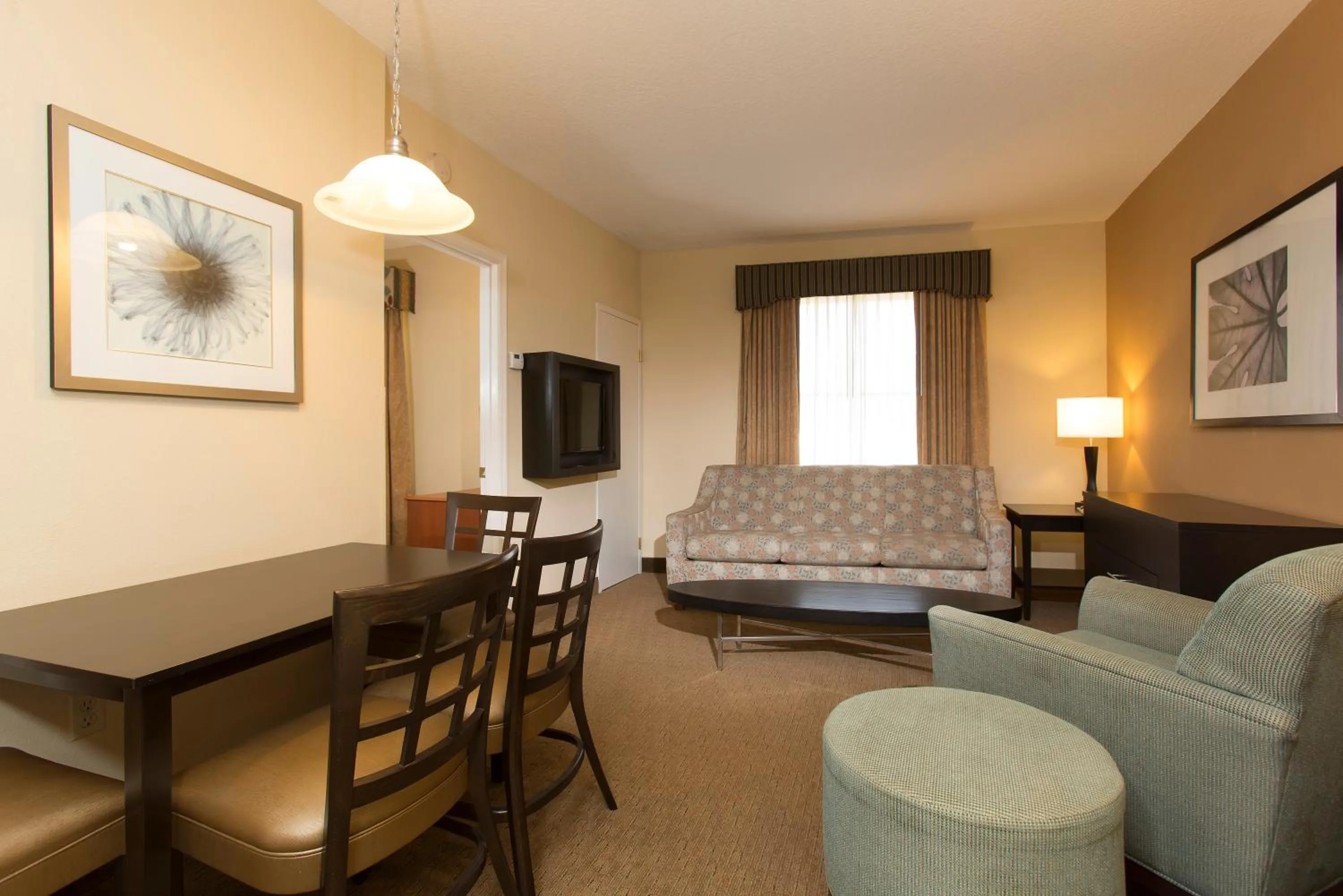 Living room, Bed in staySky Suites I-Drive Orlando Near Universal