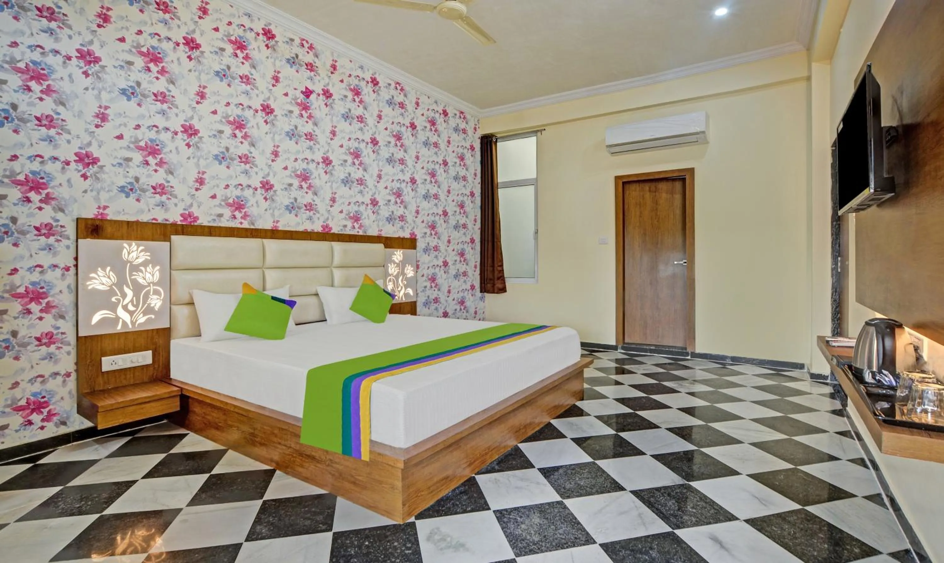 Bed in Hotel Vishvam Residency Udaipur