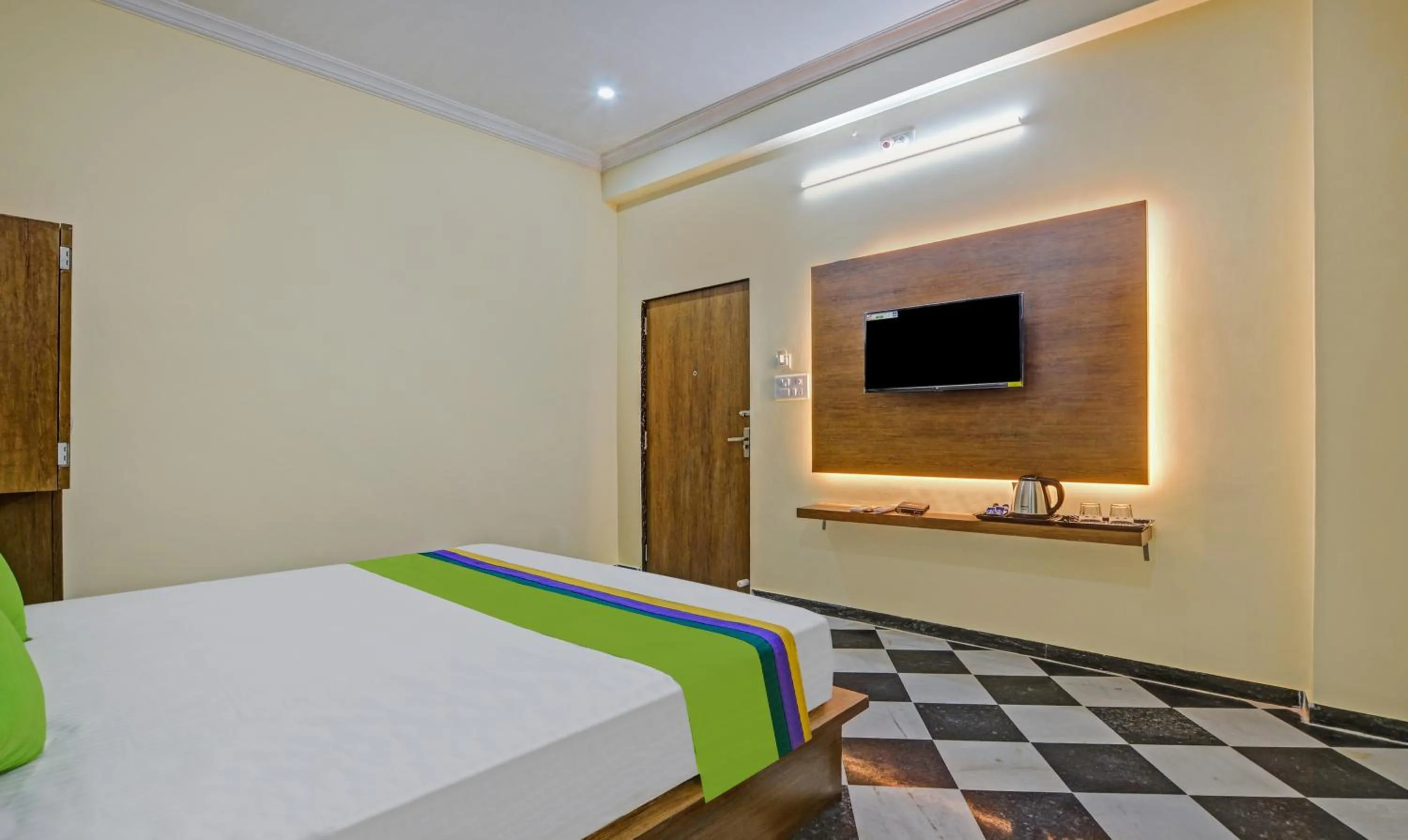 Bed in Hotel Vishvam Residency Udaipur