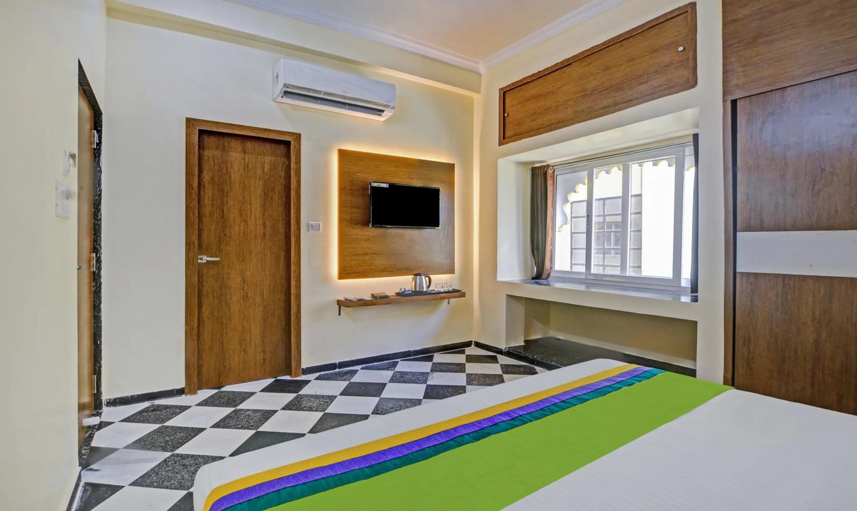 Bed in Hotel Vishvam Residency Udaipur