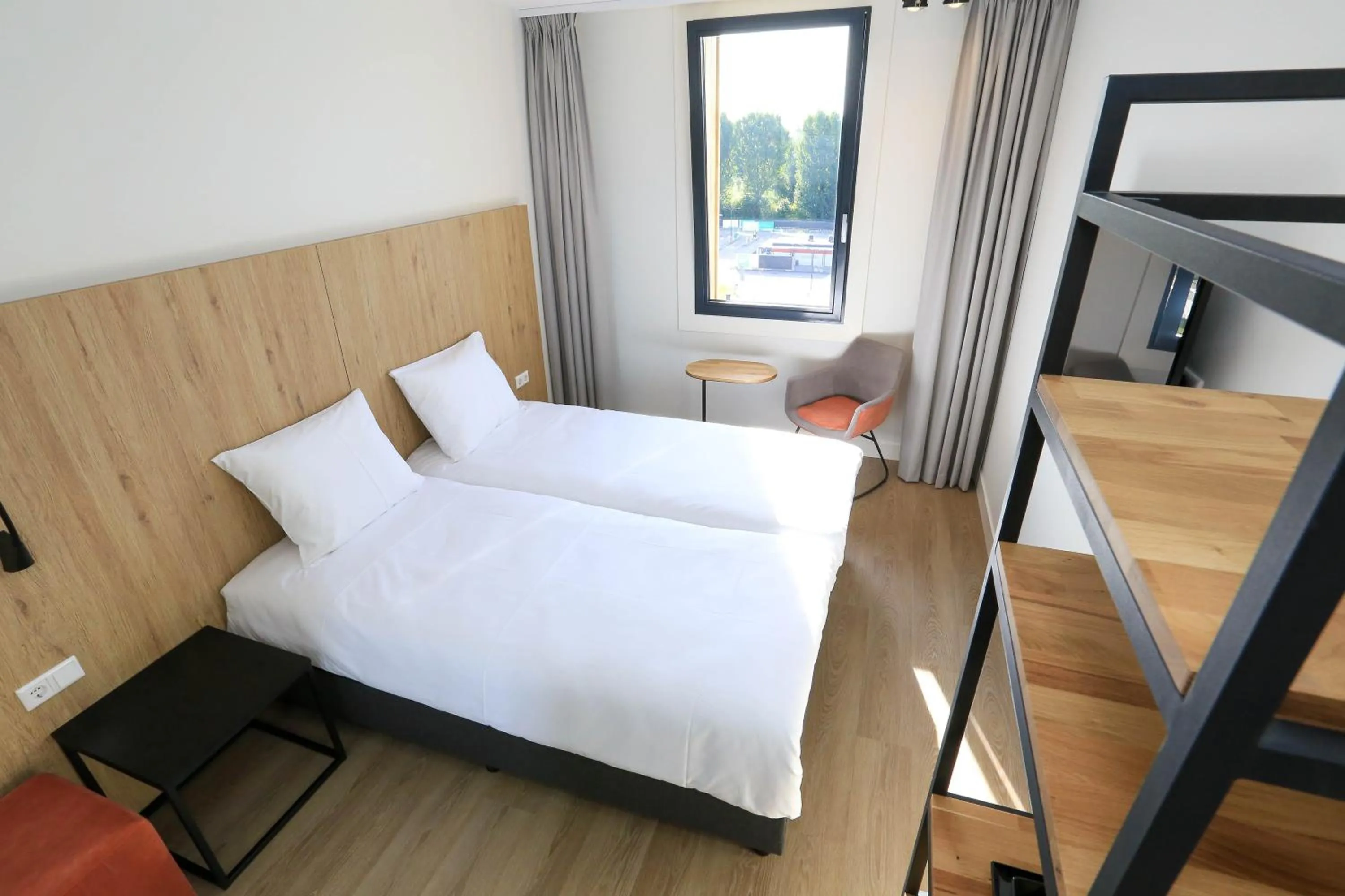 Bedroom, Bed in Fletcher Hotel Rotterdam-Airport