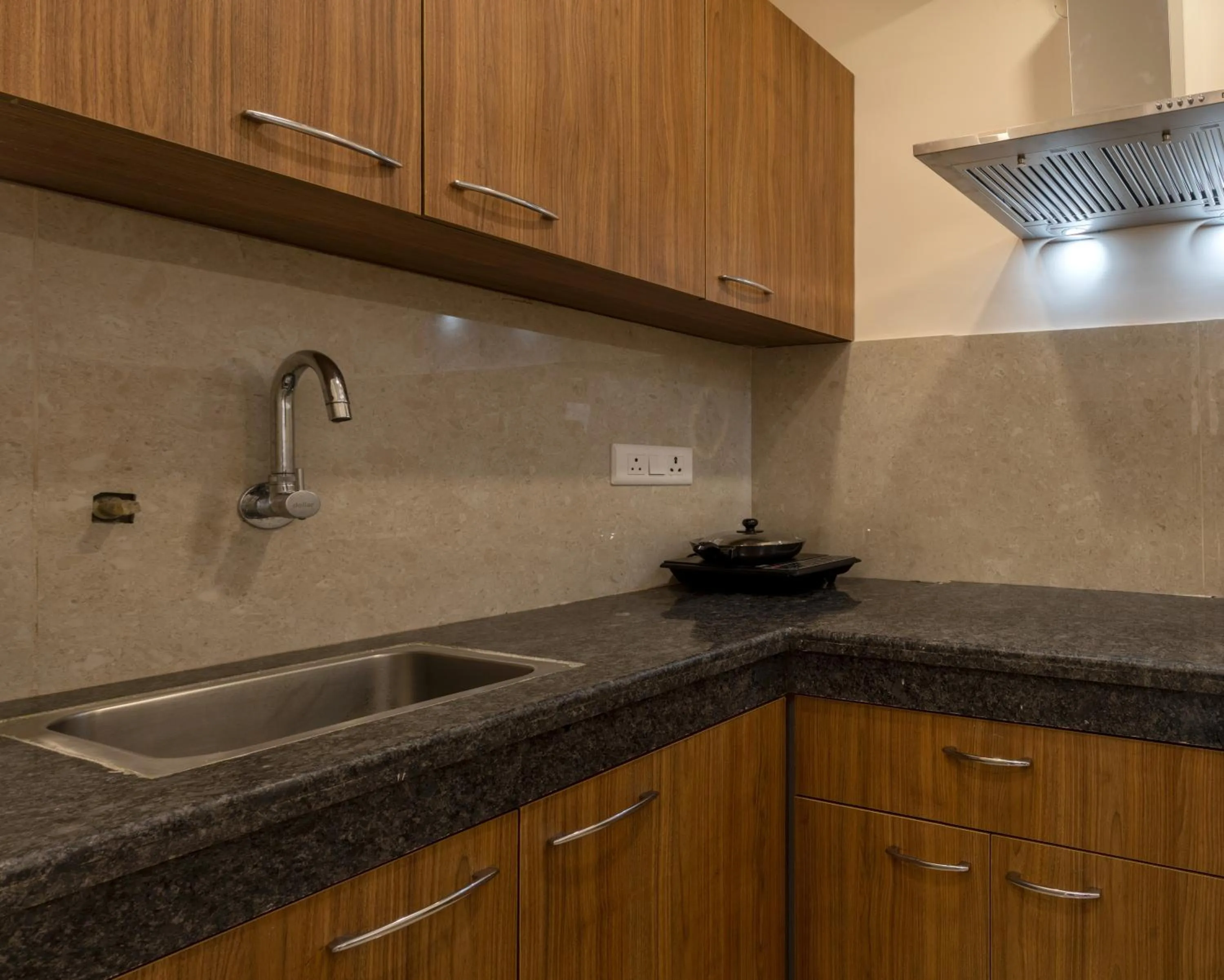 Kitchen or kitchenette in Perch Service Apartment-MG Road