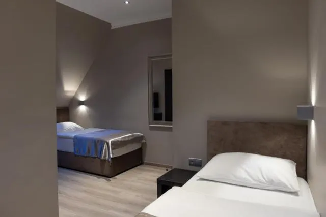 Property building, Bed in Hotel Rango