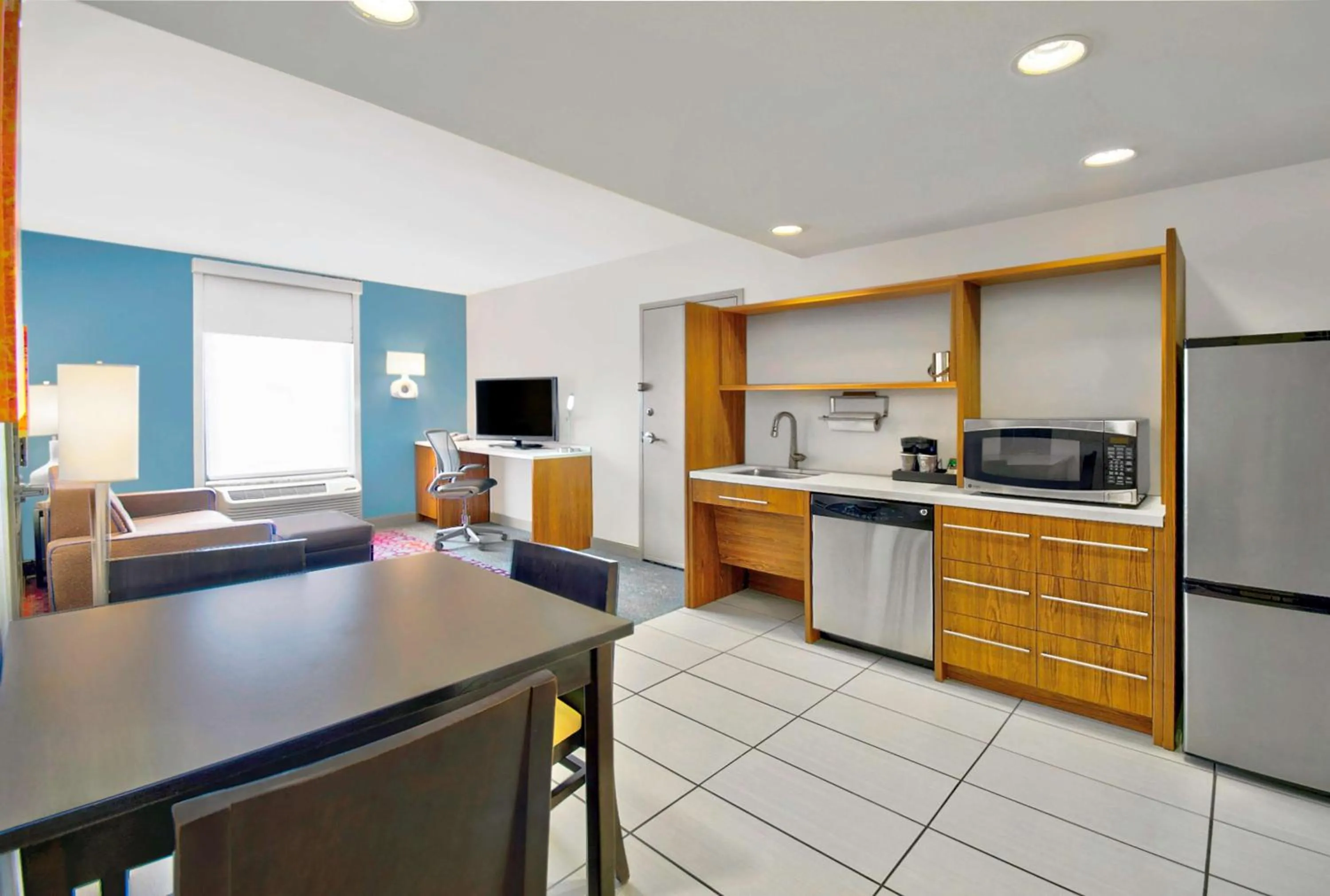 Living room in Home2 Suites by Hilton Rochester Henrietta, NY