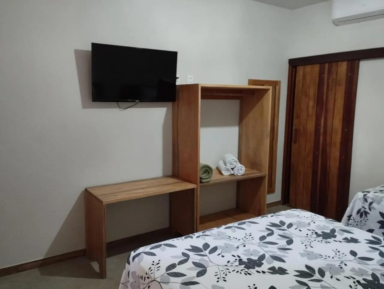 Bed in Pousada Milagres do Embaúba