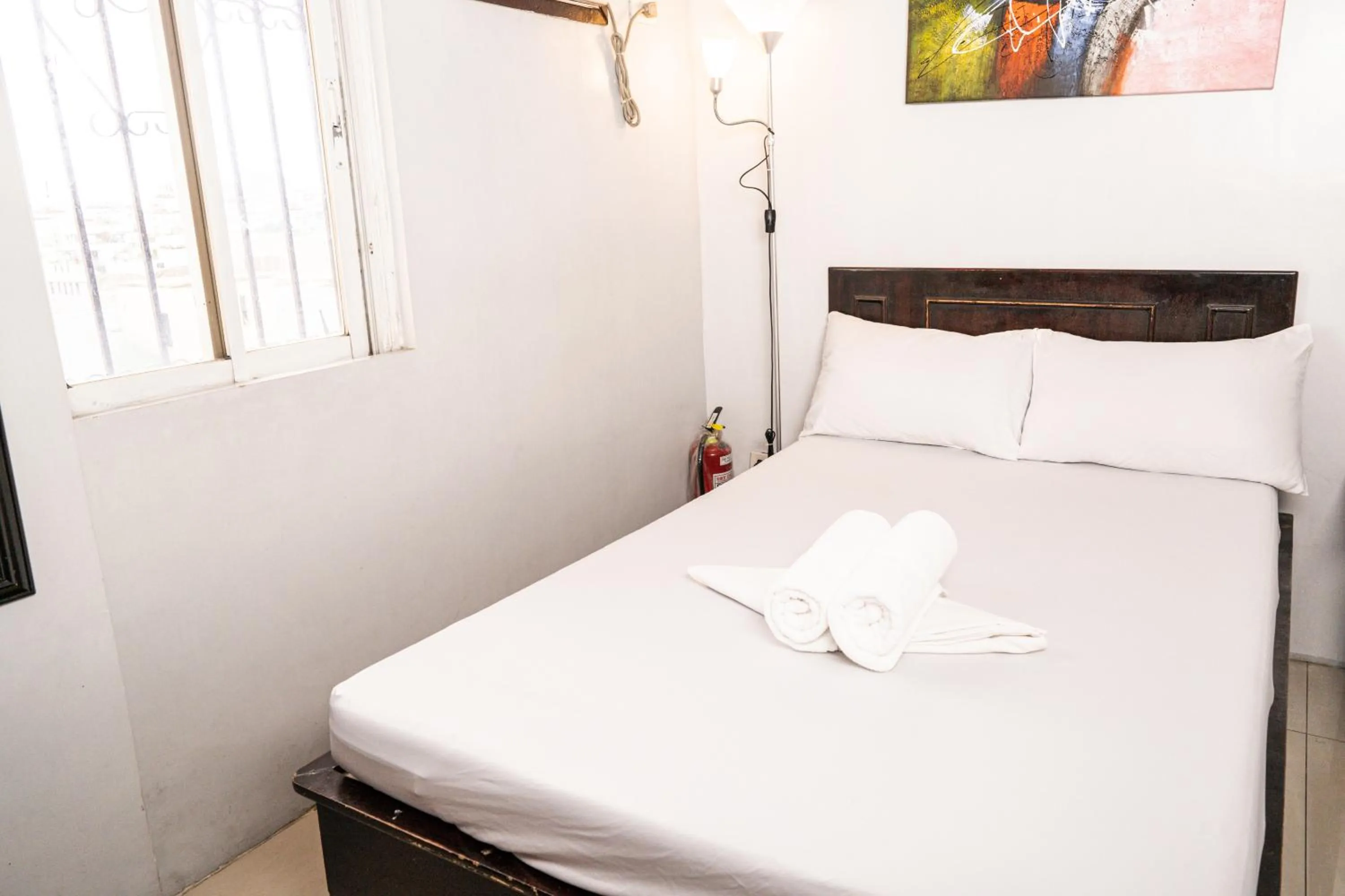 Bed in GETZ HOTEL MANILA