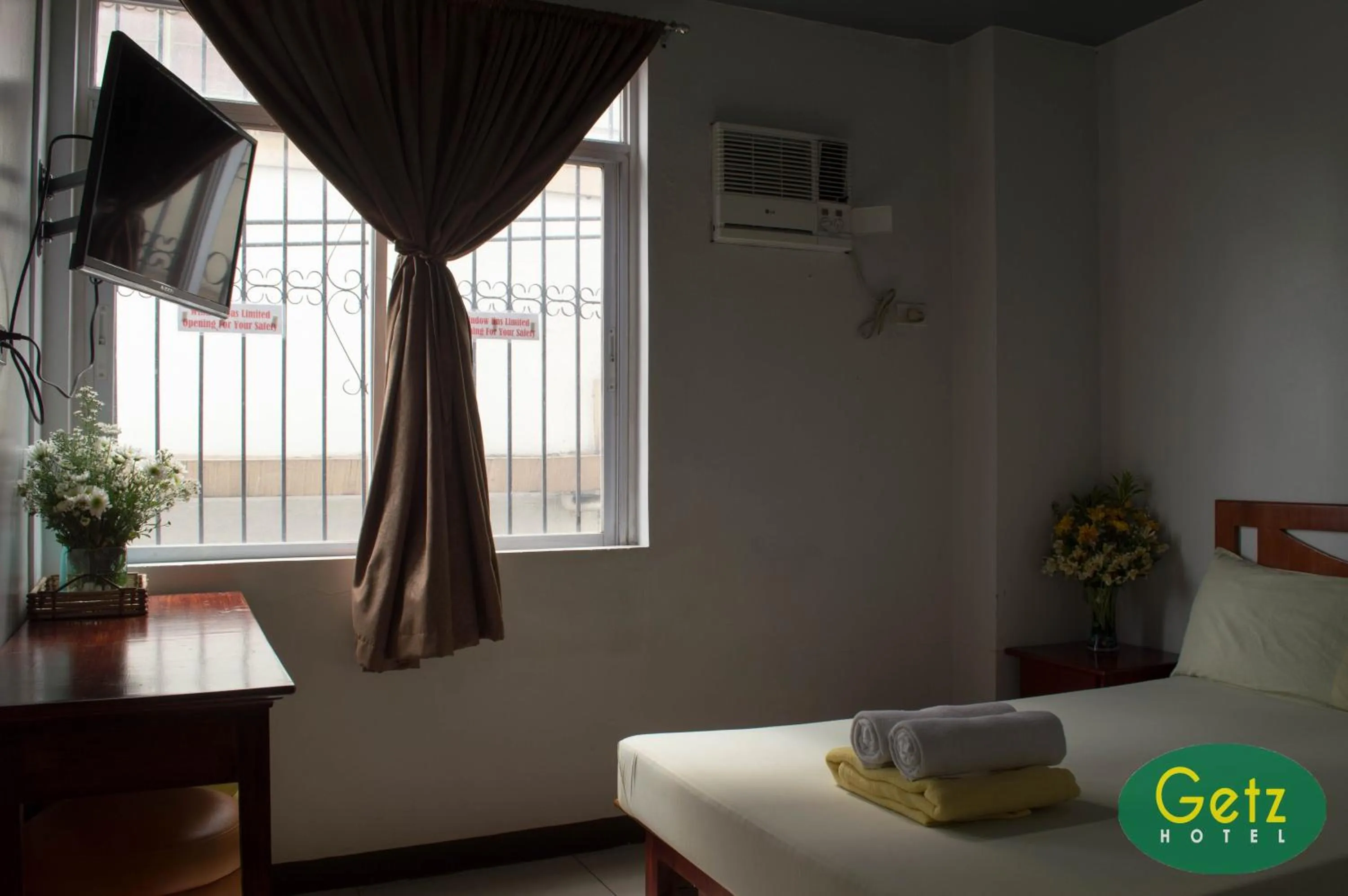 Bed in GETZ HOTEL MANILA