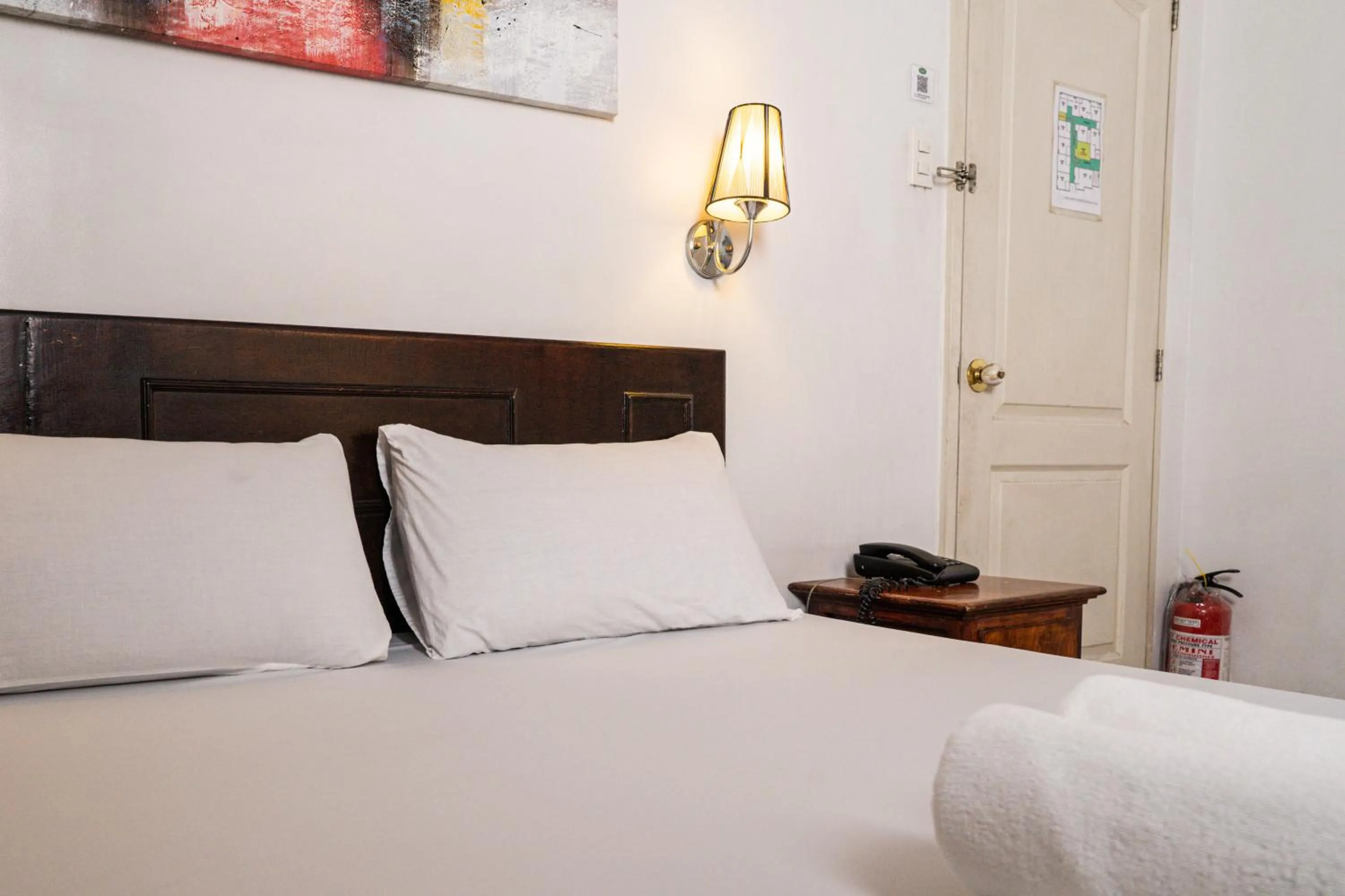 Bed in GETZ HOTEL MANILA