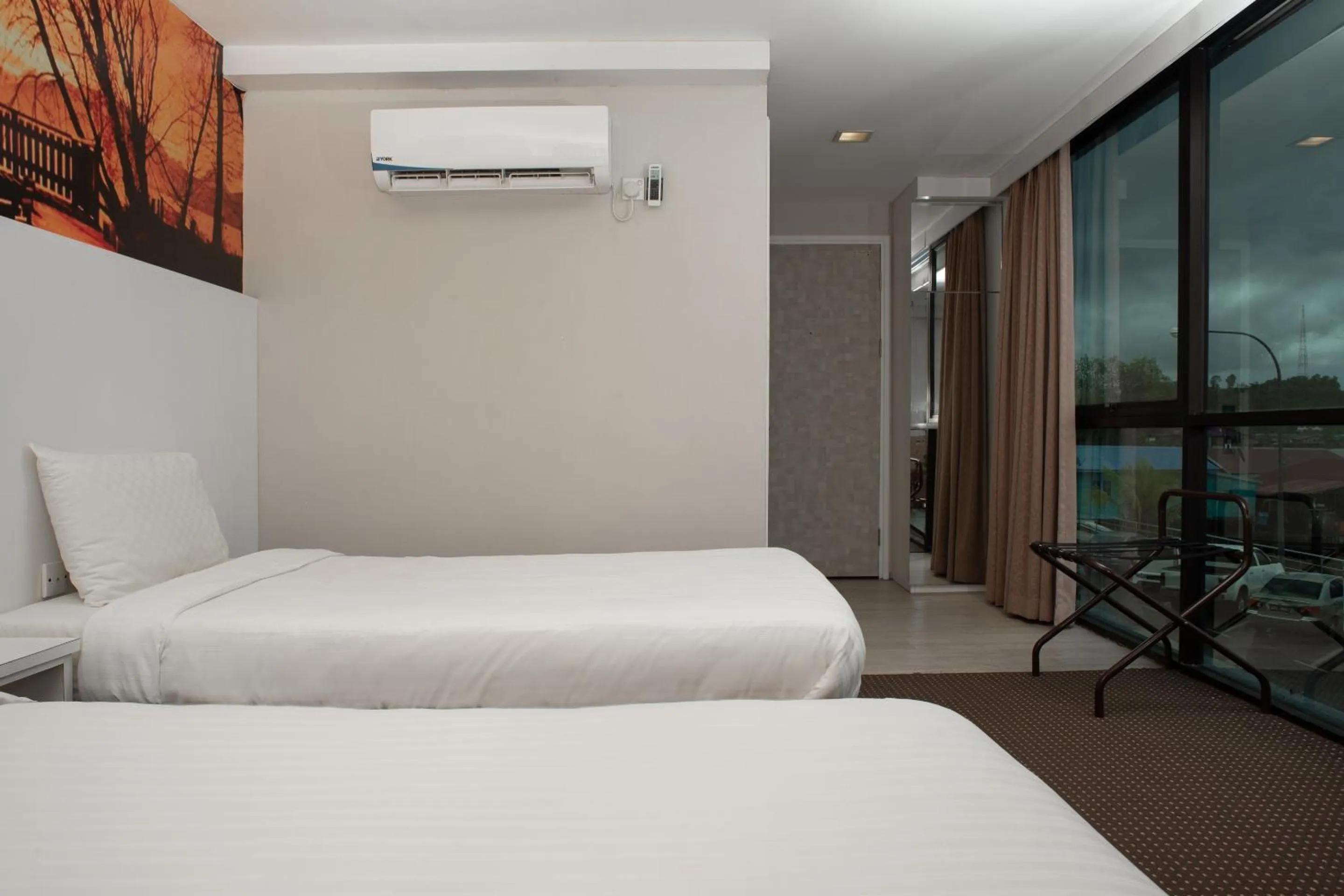 Bedroom in Capital O 90083 Riverfront Inn