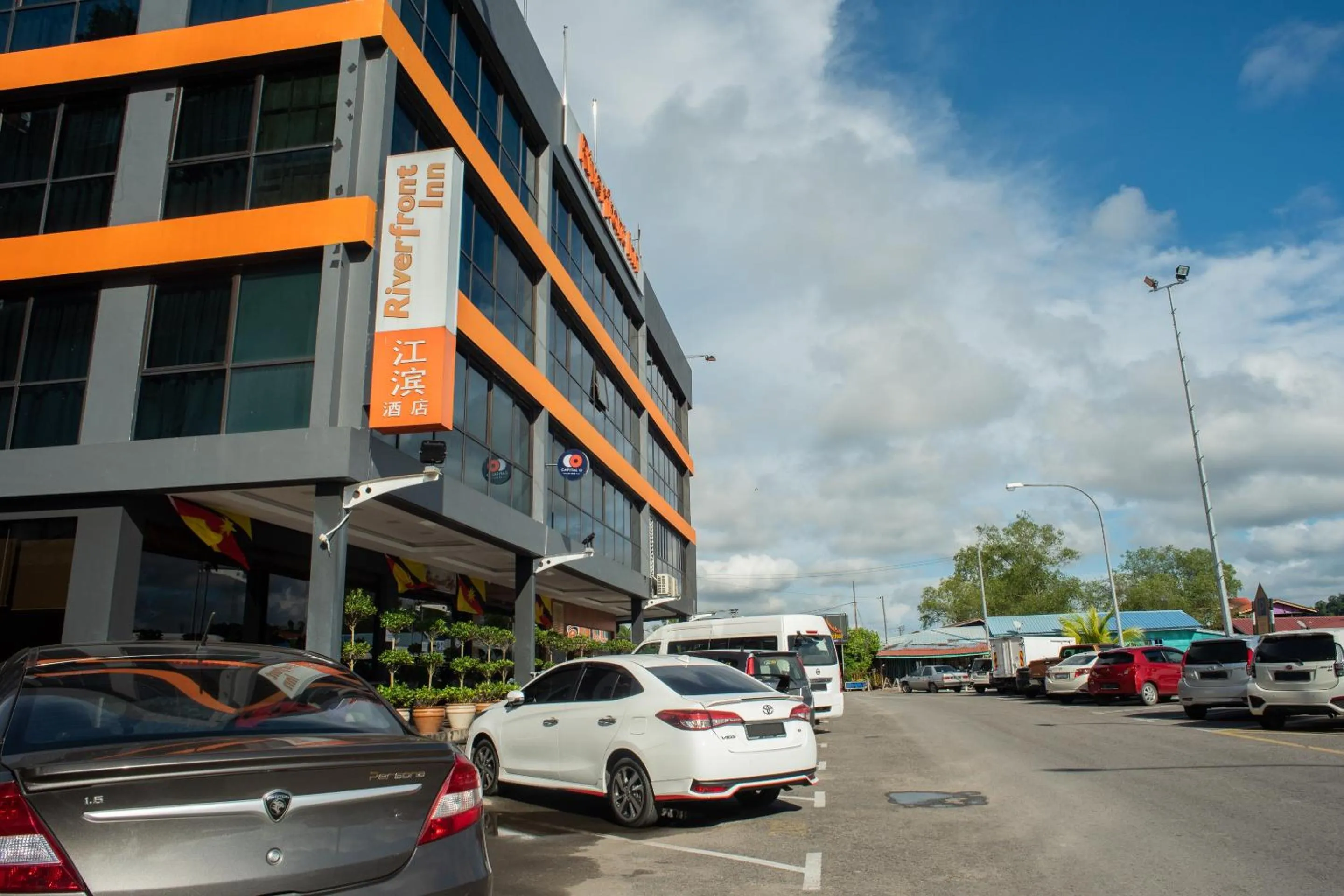 Property building in Capital O 90083 Riverfront Inn