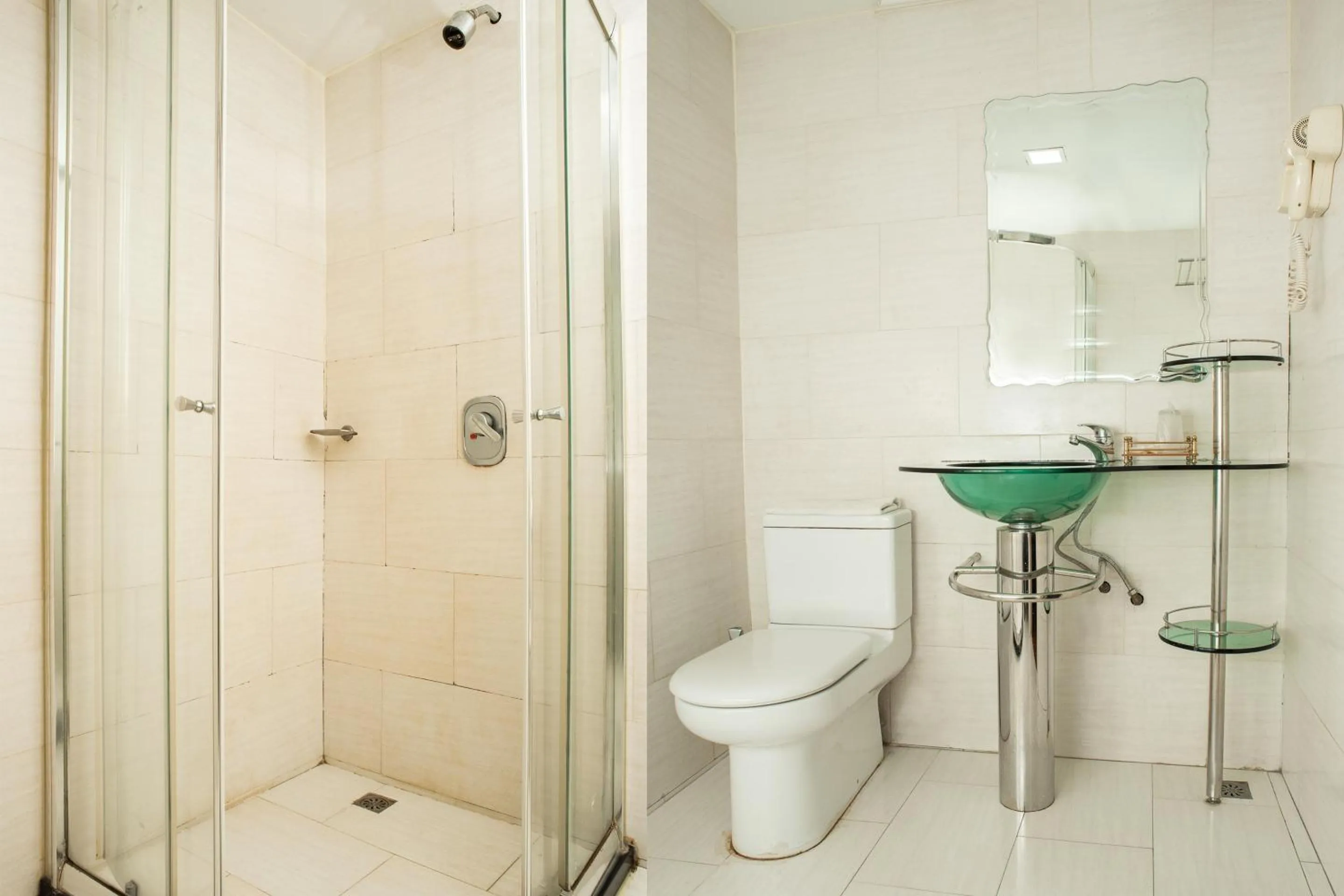 Bathroom in Capital O 90083 Riverfront Inn