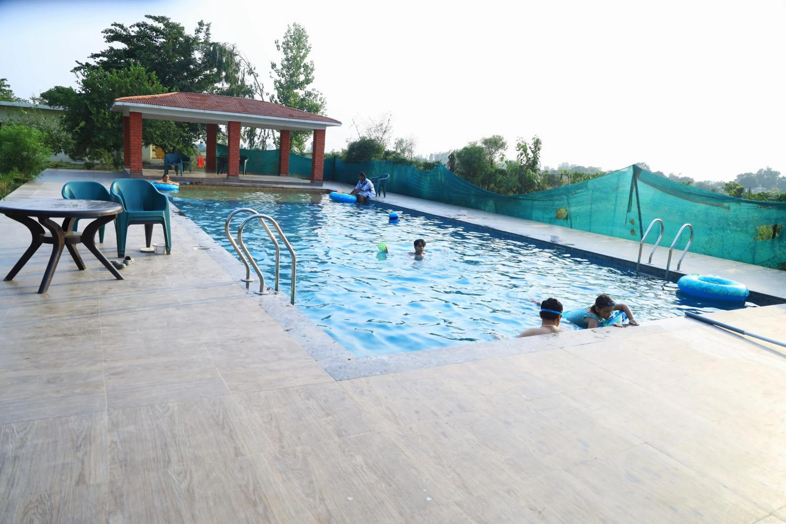 Swimming pool in Vanasthali Jungle Resort Jim Corbett