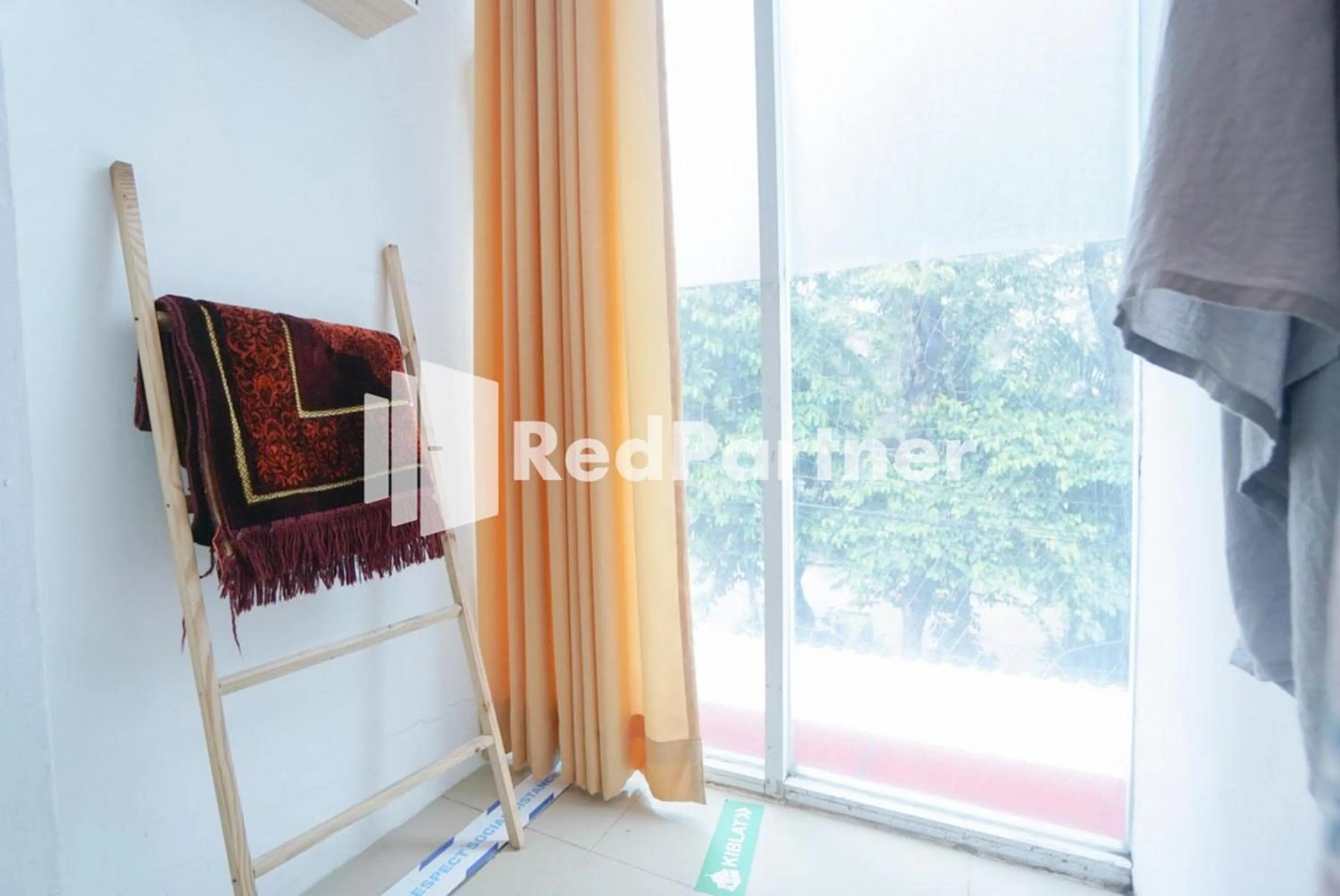 Place of worship in Eascot Hotel Mitra RedDoorz