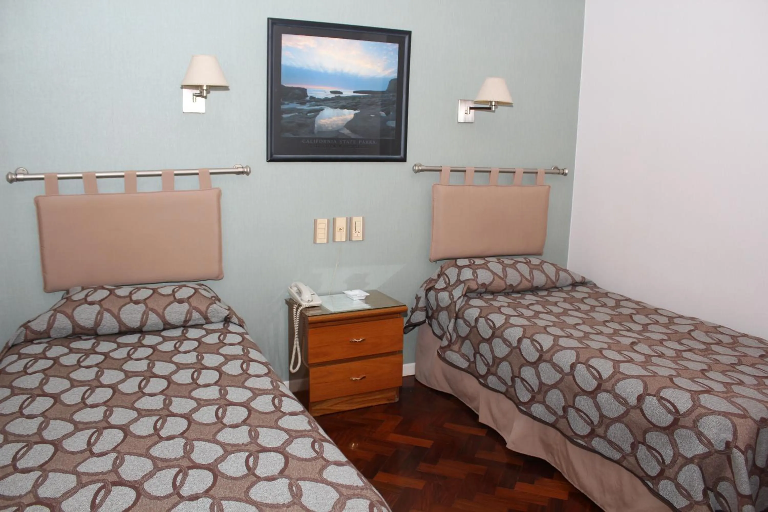 Bed in Ayacucho Palace Hotel