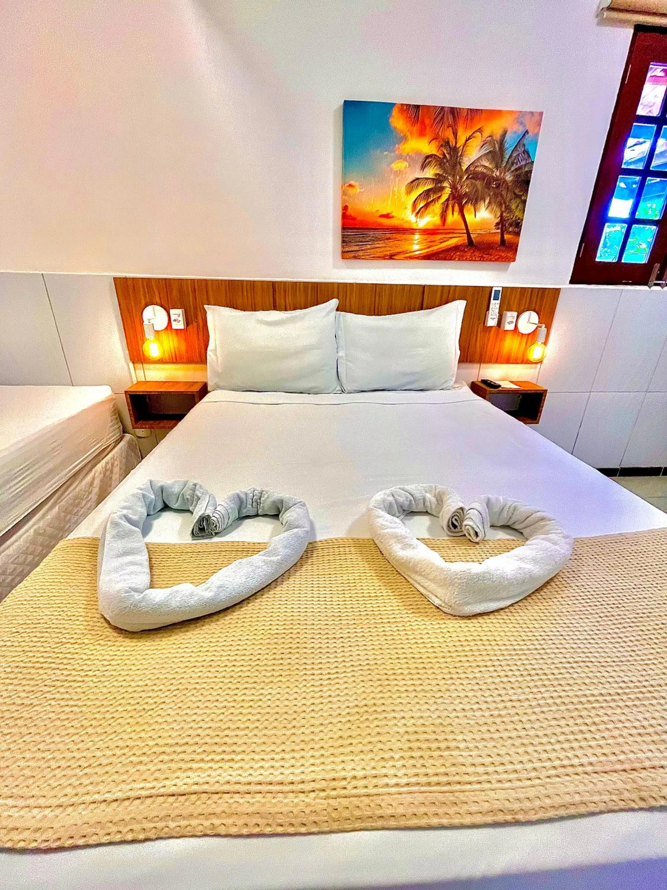 Bed in Pousada La Riviera - Pé na areia e Passeios em Maragogi