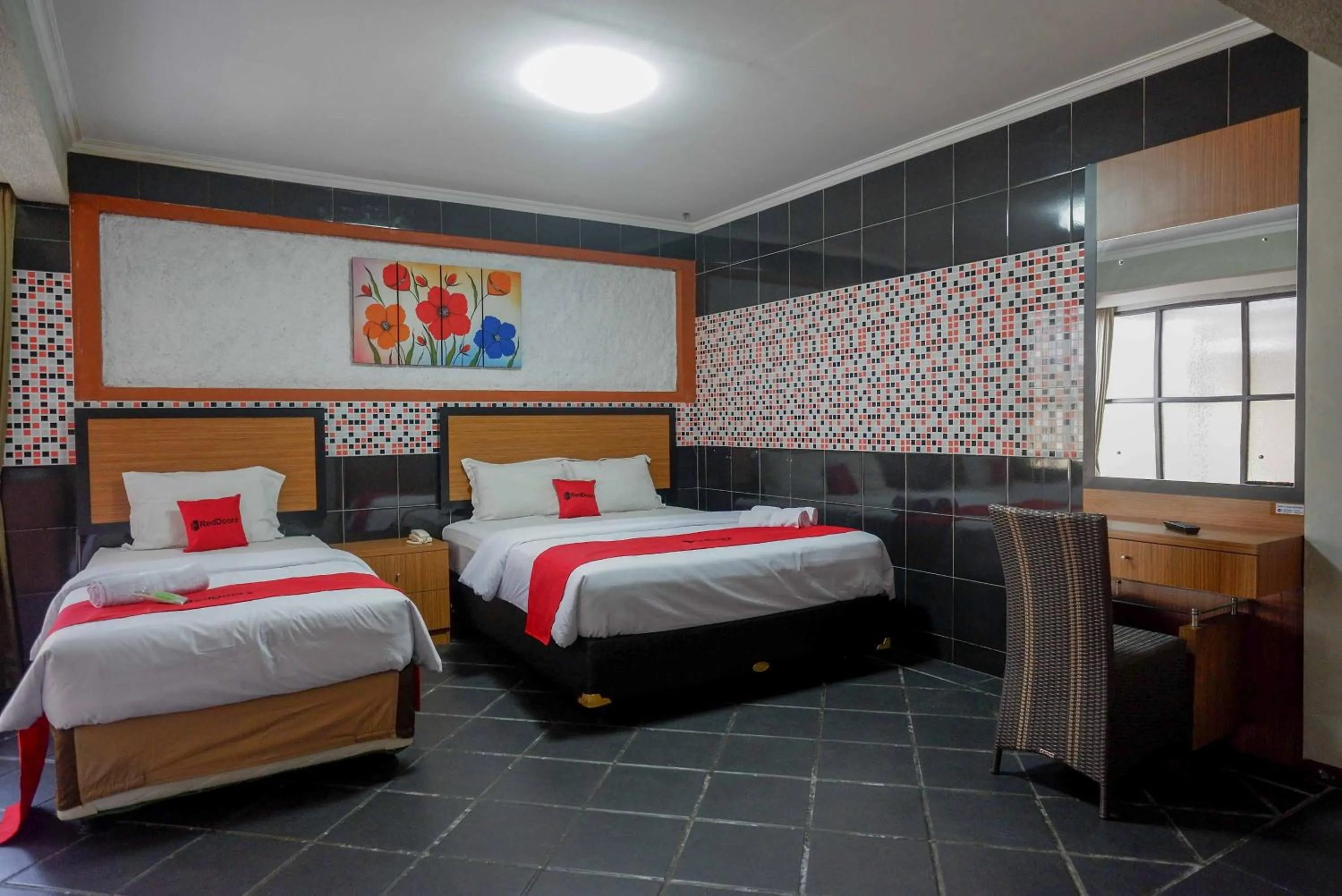 Bed in RedDoorz Plus near Amplaz Yogyakarta