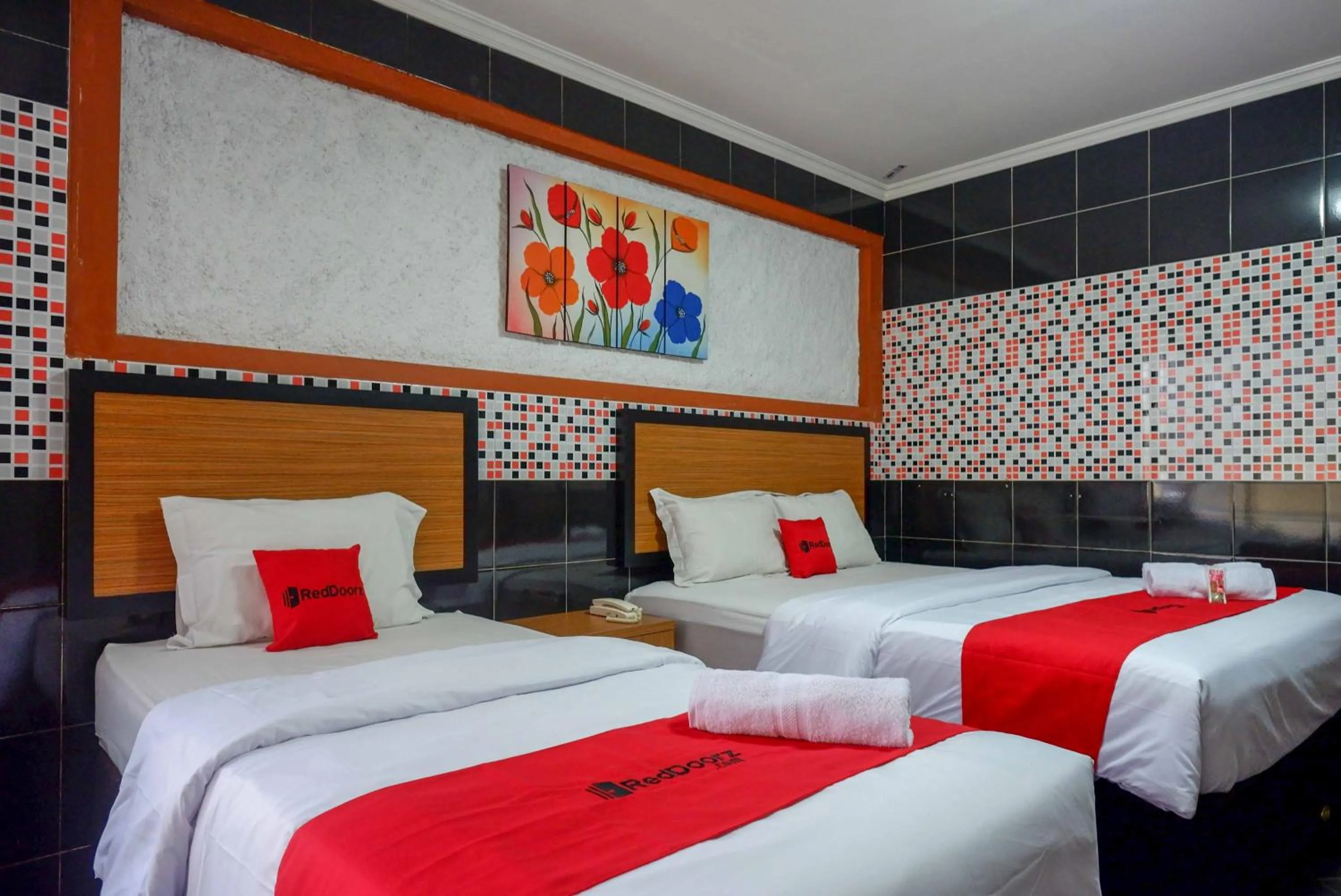 Bed in RedDoorz Plus near Amplaz Yogyakarta