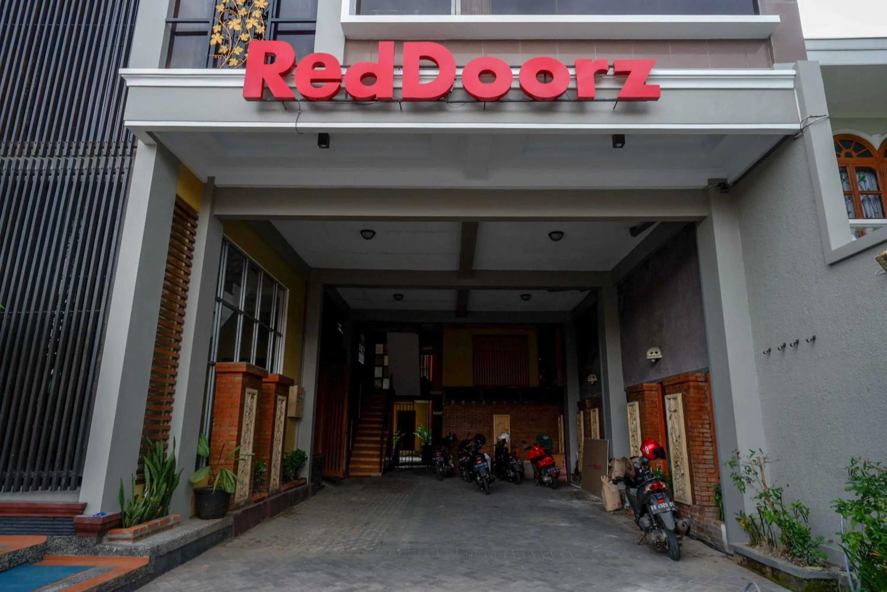 Property logo or sign in RedDoorz Plus near Amplaz Yogyakarta