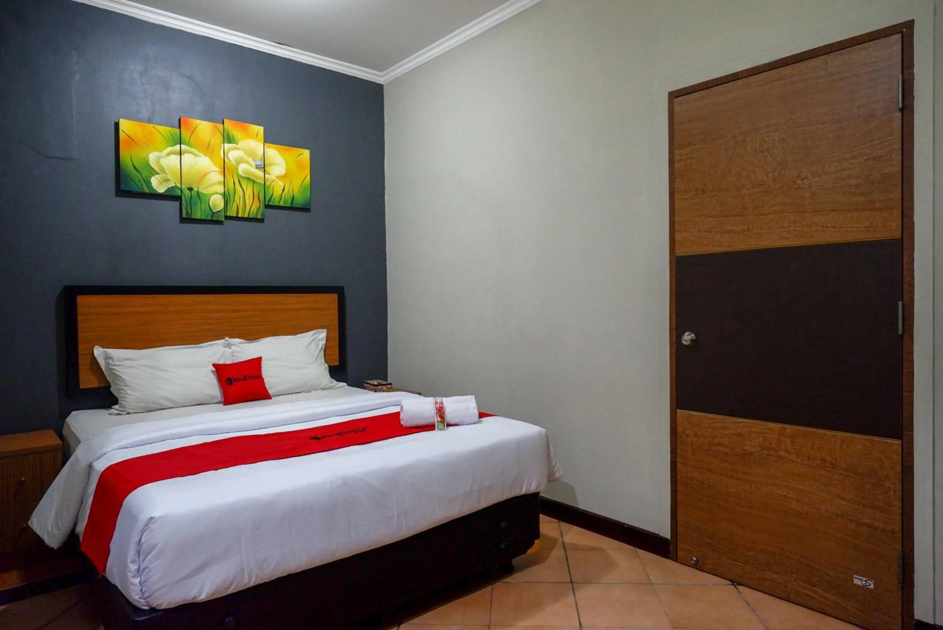 Bed in RedDoorz Plus near Amplaz Yogyakarta