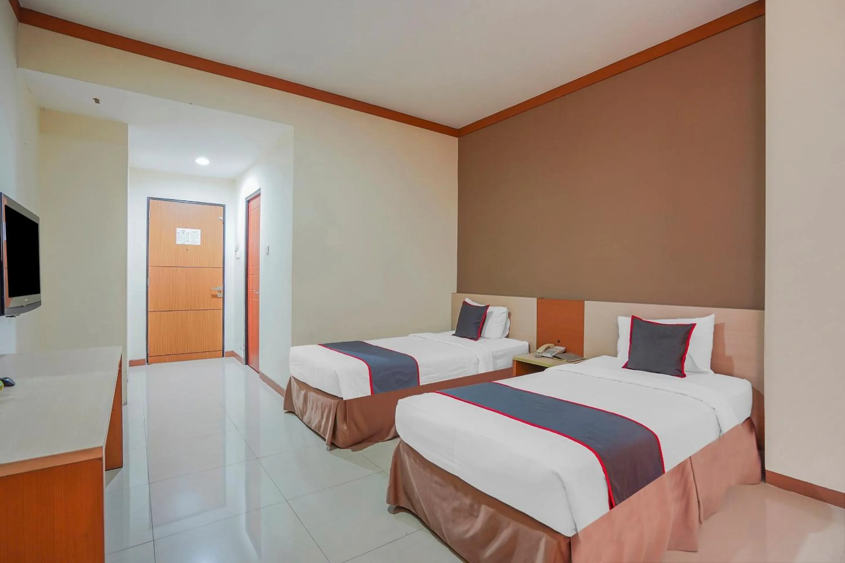 Bedroom in Collection O 90724 Hotel Sinar Sidoarjo