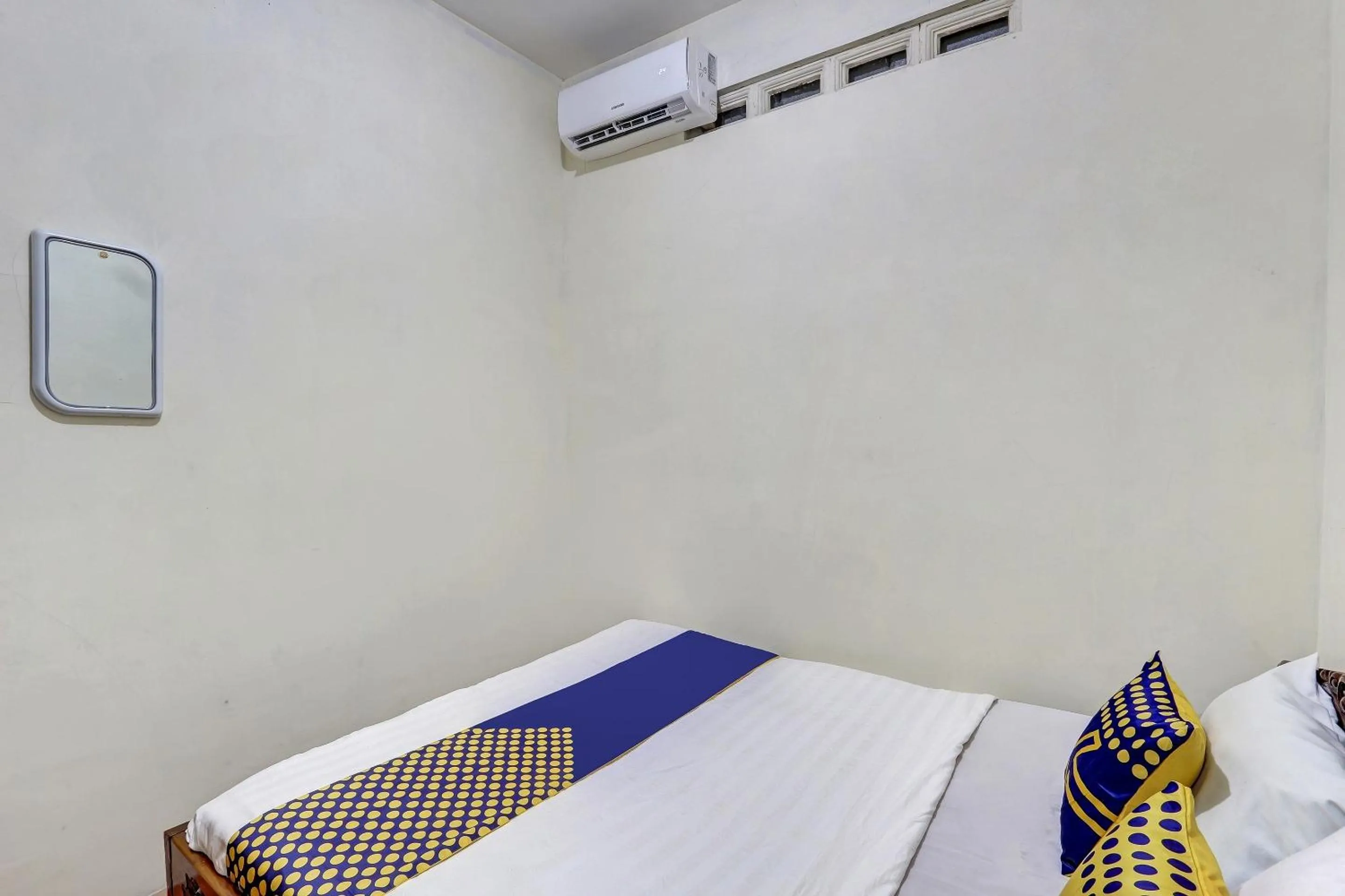 Bedroom, Bed in Hotel O Alika Homestay