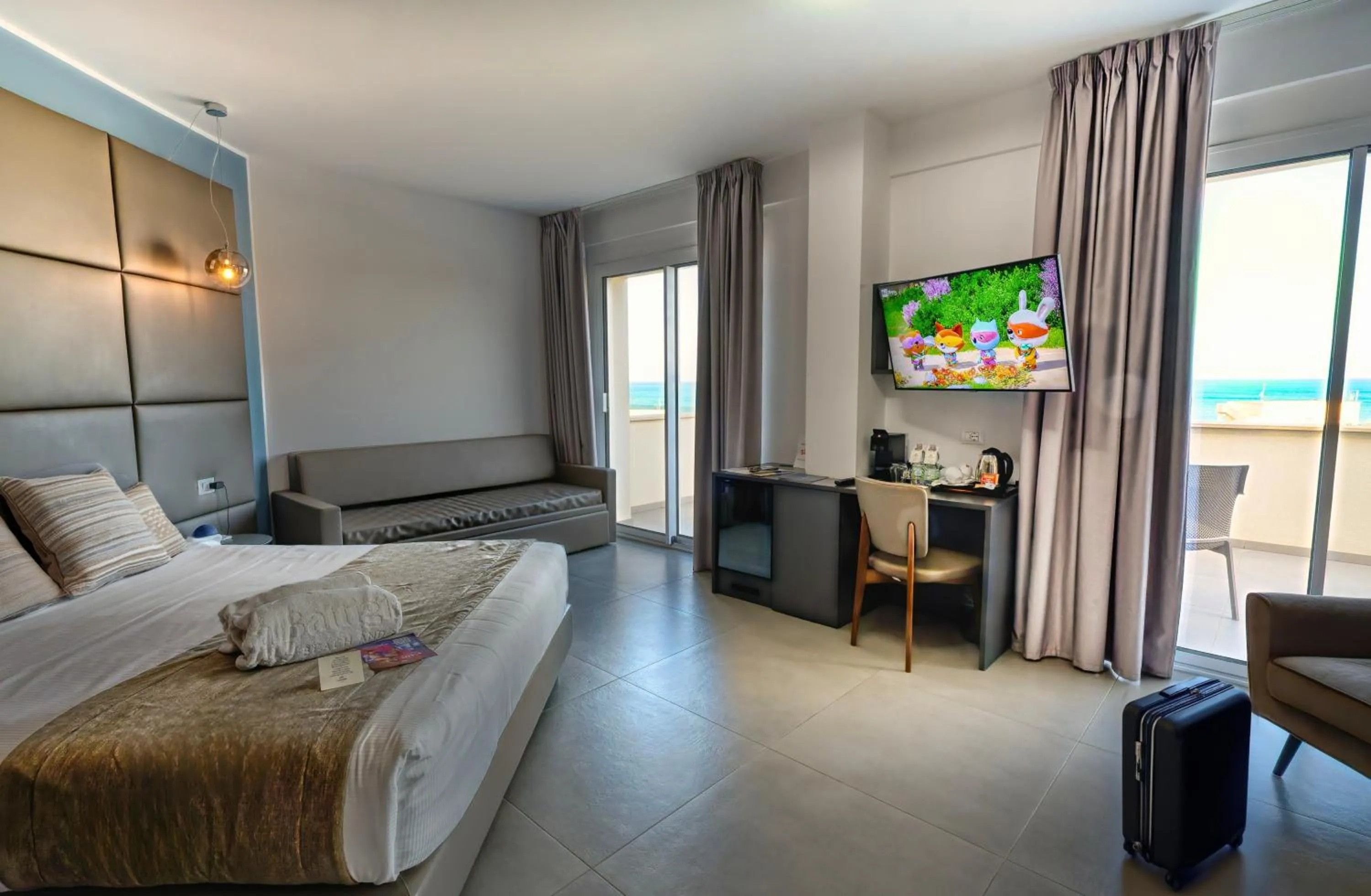 Bed in Resort La Battigia Beach & Spa