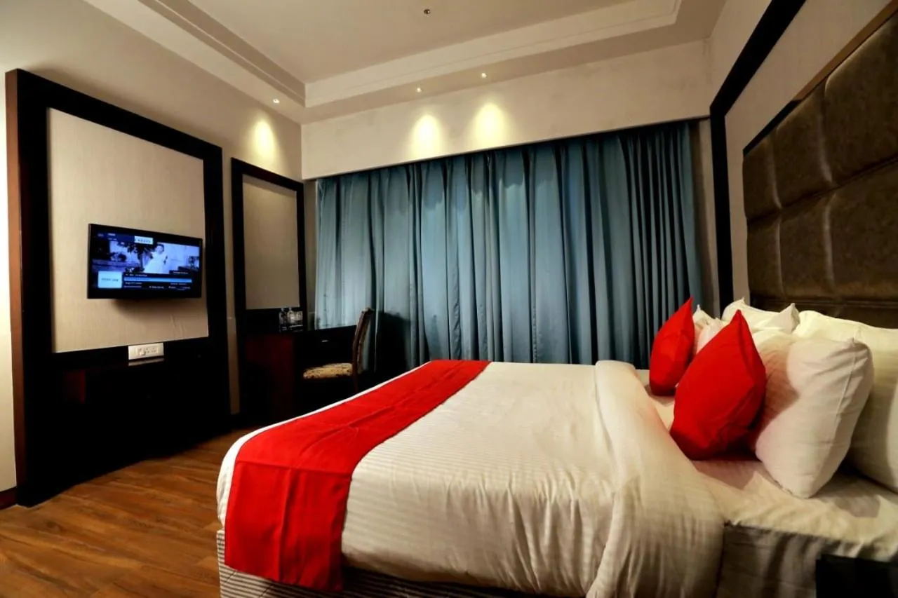 Bed in The Stella Hotel & Resort