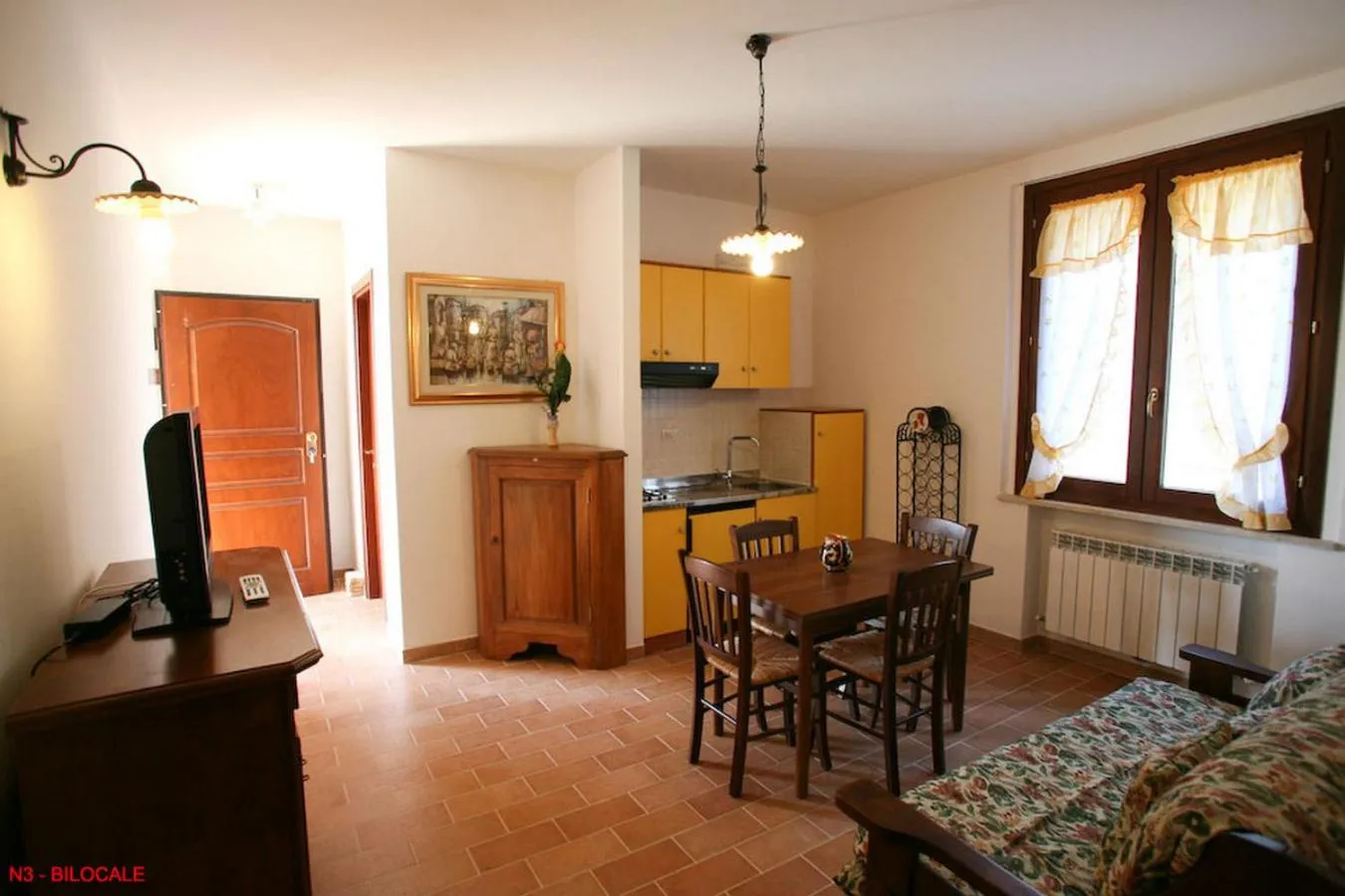 Kitchen or kitchenette in La casa di Carla