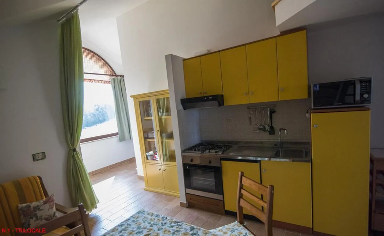 Kitchen or kitchenette in La casa di Carla