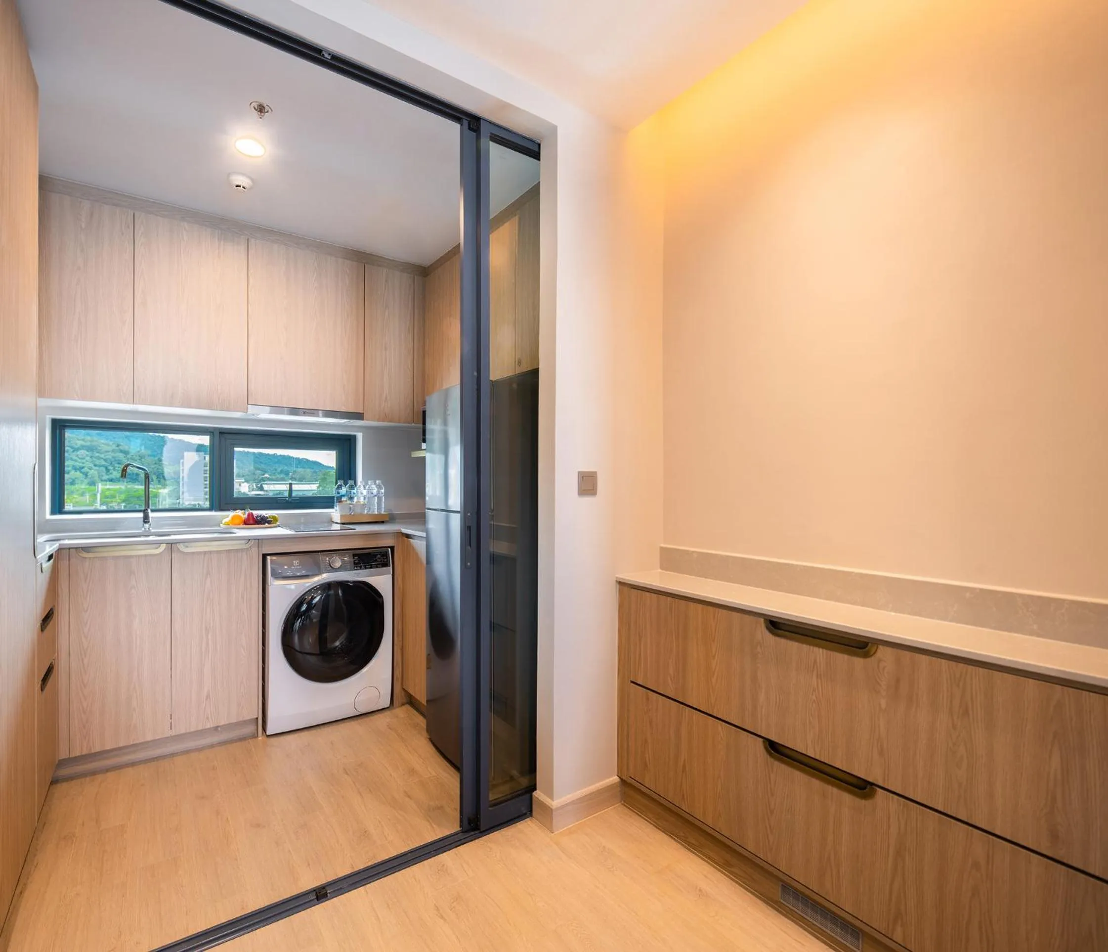 Kitchen or kitchenette in S Sriracha Hotel & Residence